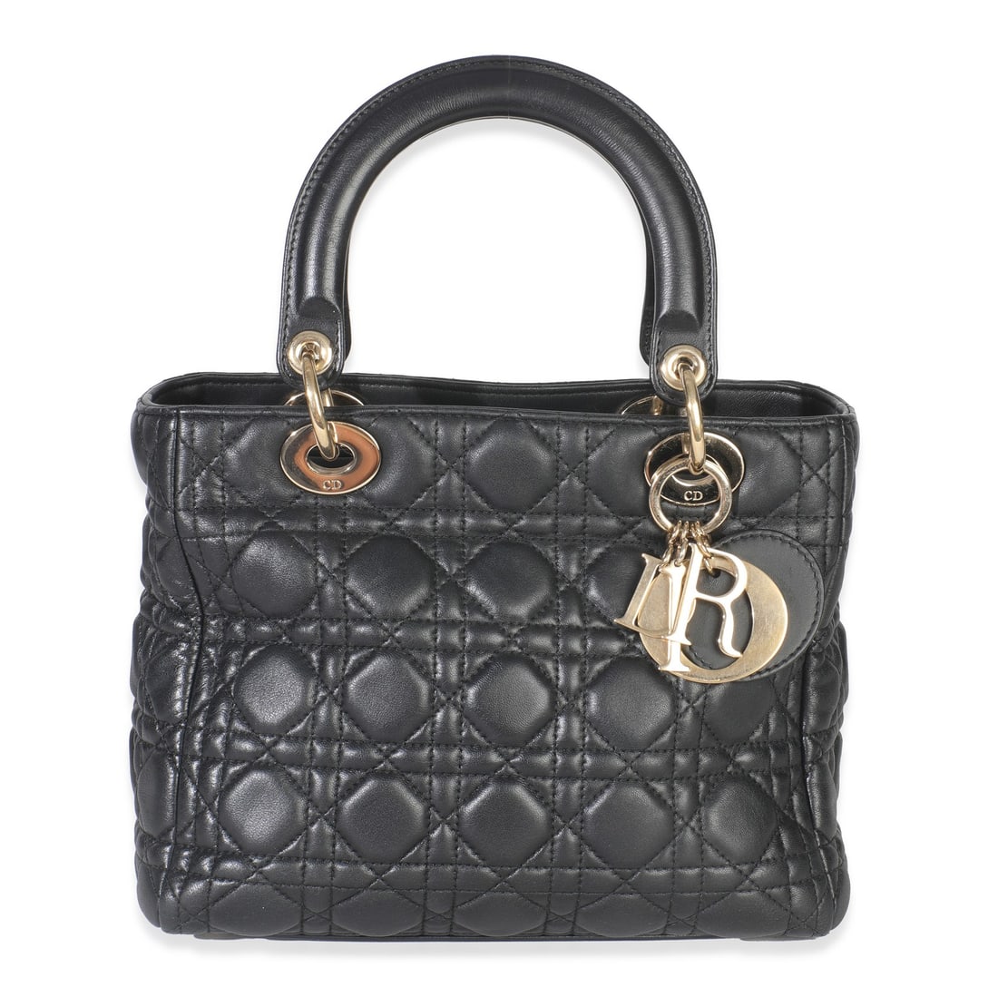Black Leather Medium Lady Dior Shoulder Bag by Christian Dior: Black Leather Medium Lady Dior Shoulder Bag by Christian Dior This Christian Dior Medium Lady Dior bag is crafted from black lambskin leather with signature cannage stitching. It features gold-tone ha
