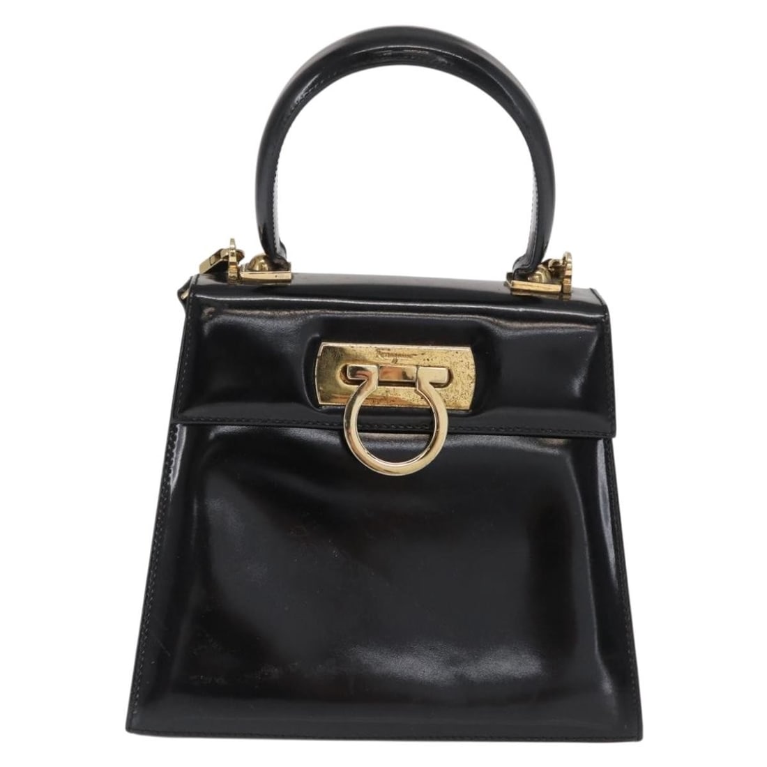 Gancini Black Patent Leather Convertible Satchel by Salvatore Ferragamo: Gancini Black Patent Leather Convertible Satchel by Salvatore Ferragamo This Salvatore Ferragamo Gancini Convertible Top Handle Bag is crafted from black patent leather and designed for women. The bag