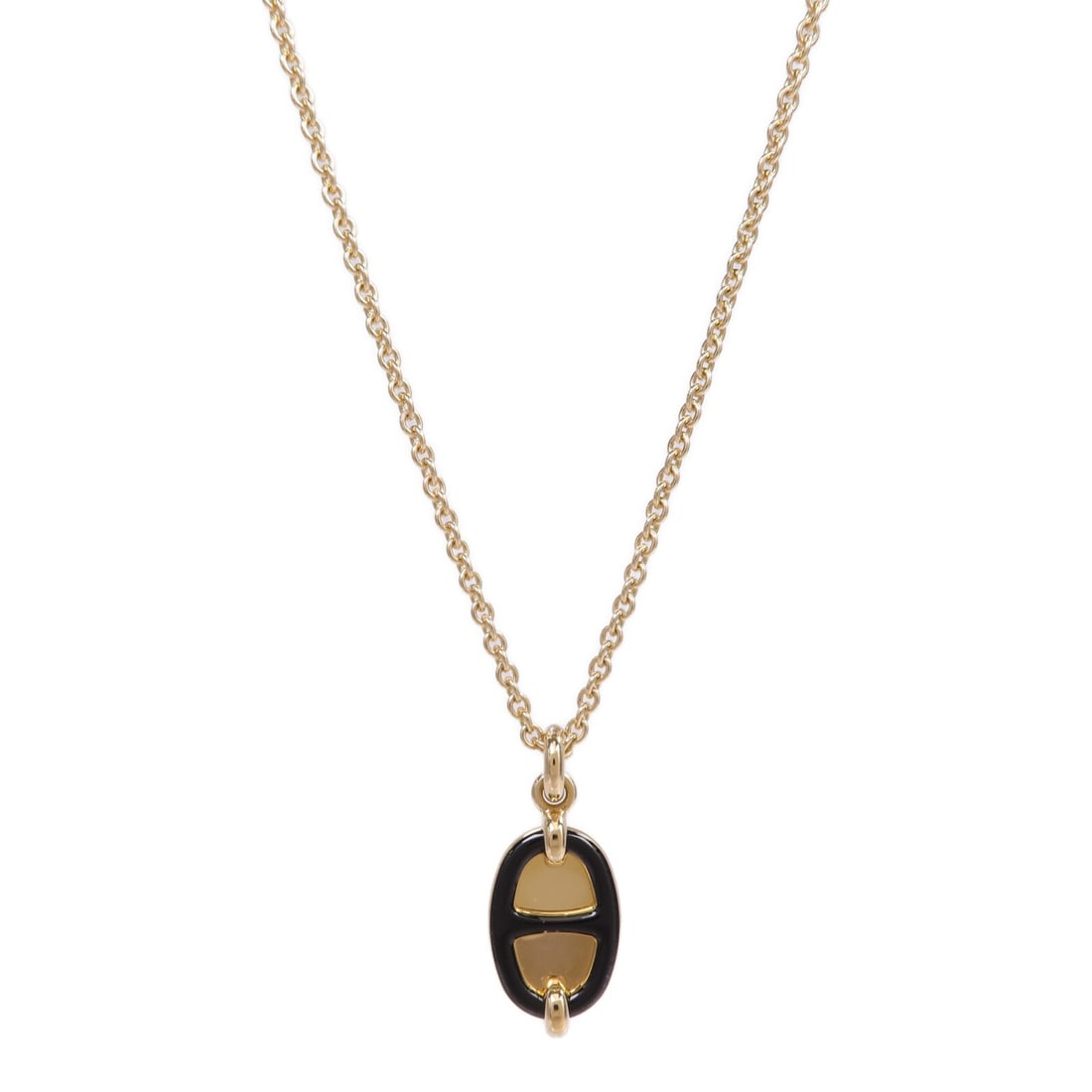 Mini Maillon Pendant Necklace by Hermes in Gold and Black: Mini Maillon Pendant Necklace by Hermes in Gold and Black This HERMES Mini Maillon pendant necklace features a sleek metal design with a gold and black finish. The necklace does not include a main sto