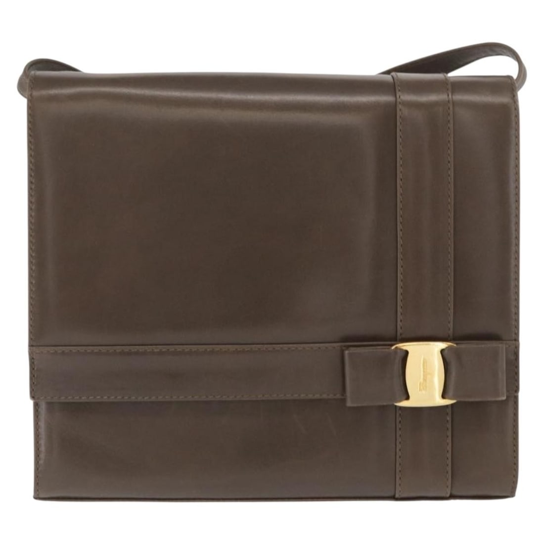Vara Shoulder Bag by Salvatore Ferragamo in Brown Leather: Vara Shoulder Bag by Salvatore Ferragamo in Brown Leather This Salvatore Ferragamo Vara shoulder bag is crafted from brown leather and designed for women. Made in Italy, it features a structured silho
