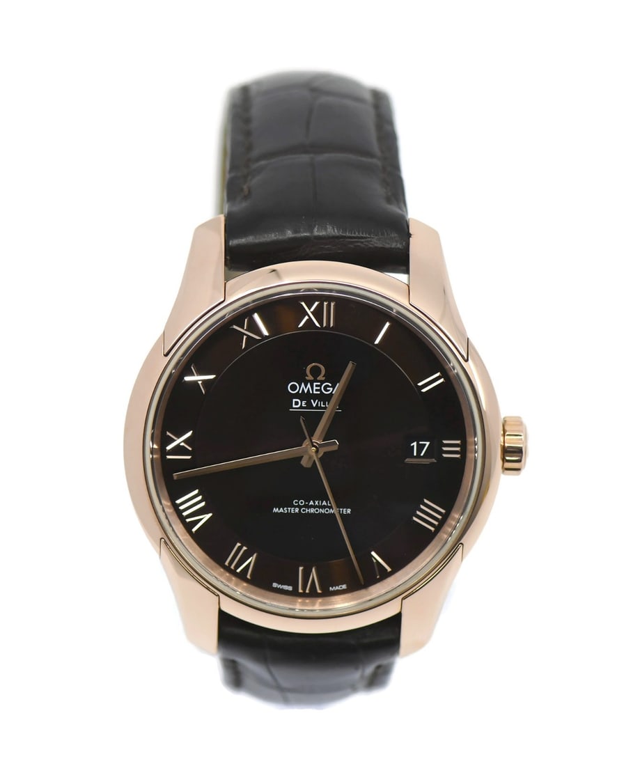 OMEGA De Ville Hour Vision 18K Rose Gold Automatic Watch 41mm: OMEGA De Ville Hour Vision 18K Rose Gold Automatic Watch 41mm Experience the elegance of the Omega DeVille Hour Vision, a stunning wristwatch crafted from 18K rose gold. This timepiece features a mech