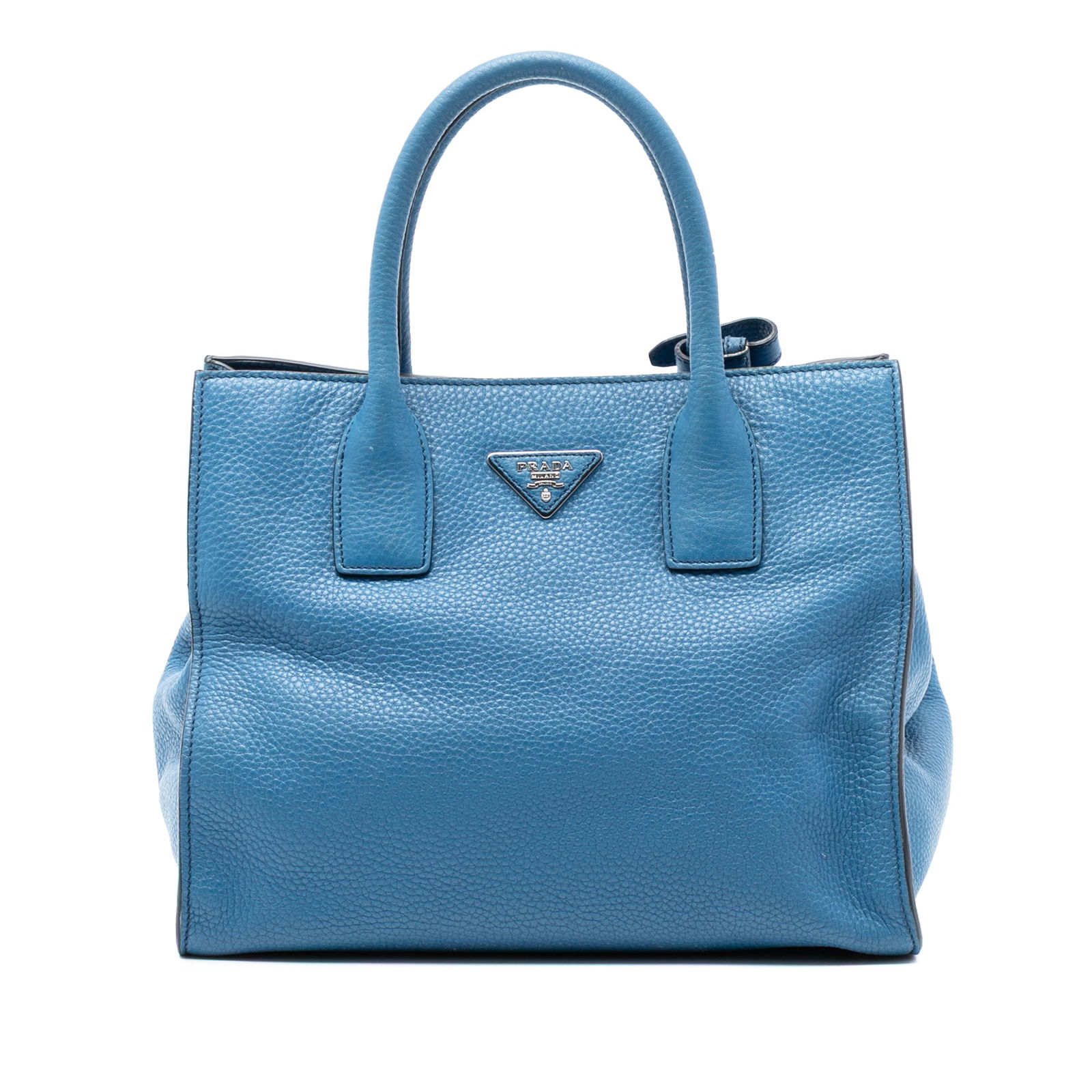 Prada Vitello Daino Blue Leather Convertible Satchel Tote Bag: Prada Vitello Daino Blue Leather Convertible Satchel Tote Bag This Prada Vitello Daino Open Convertible Tote is crafted from blue leather and features rolled leather handles, an open top with a snap b
