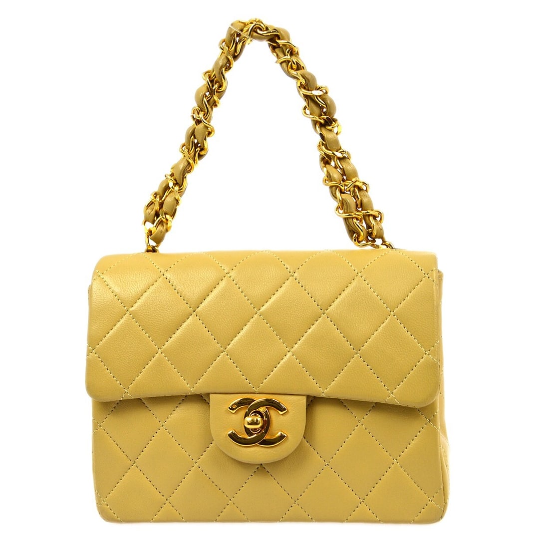 Chanel Mini Classic Square Flap Handbag Beige Lambskin Leather: Chanel Mini Classic Square Flap Handbag Beige Lambskin Leather This exquisite Chanel Mini Classic Square Flap Handbag is crafted from luxurious beige lambskin leather, featuring a stunning matelasse p