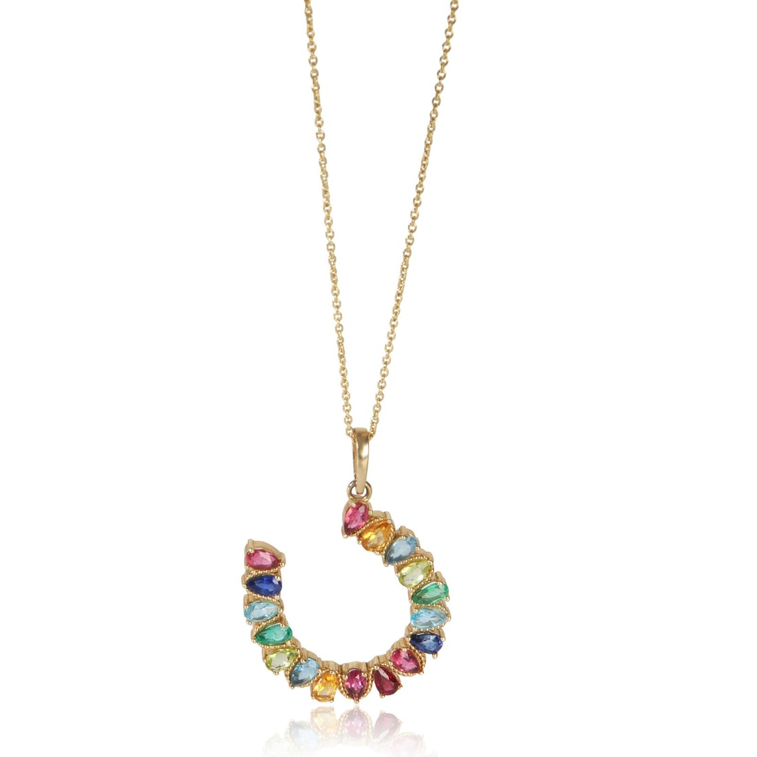 Rainbow Gemstone Horseshoe Pendant in 14K Yellow Gold: Rainbow Gemstone Horseshoe Pendant in 14K Yellow Gold This women's large horseshoe pendant features a vibrant array of pear-shaped mixed gemstones set in 14K yellow gold. The pendant is paired with an