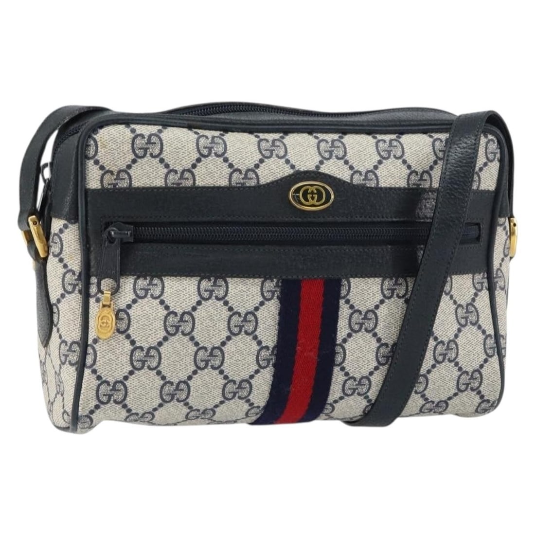 Gucci GG Supreme Sherry Line Navy PVC Shoulder Bag 75 02 004 Italy: Gucci GG Supreme Sherry Line Navy PVC Shoulder Bag 75 02 004 Italy This is a Gucci GG Supreme Sherry Line shoulder bag crafted from navy, gold, and red PVC leather and GG canvas. The bag features an a