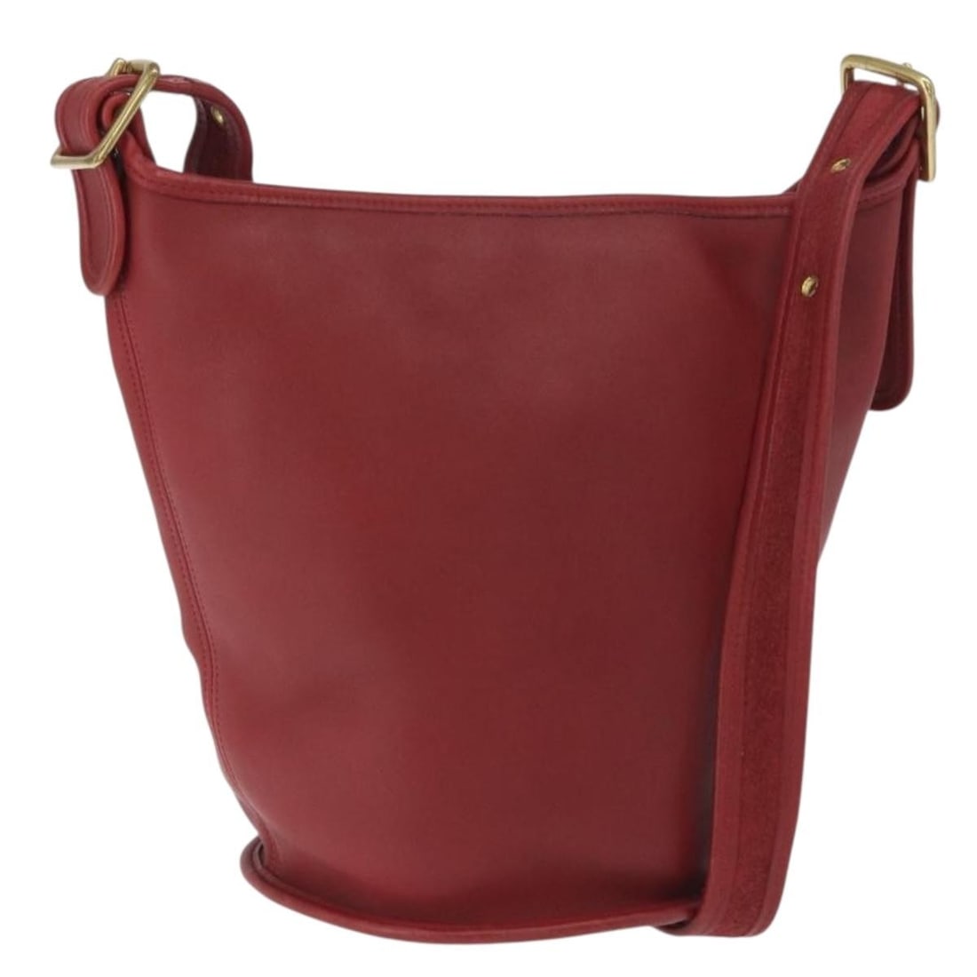 Red Leather Shoulder Bag by Coach with Gold Accents USA: Red Leather Shoulder Bag by Coach with Gold Accents USA This Coach shoulder bag features a red leather exterior with gold-tone accents. Designed with a spacious interior, it includes an adjustable sho