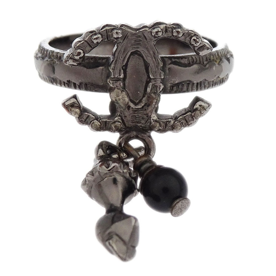 Chanel Vintage Silver Plated Dangle CC Ring Size 50: Chanel Vintage Silver Plated Dangle CC Ring Size 50 This exquisite vintage Chanel ring features a beautiful silver-plated design, showcasing the iconic CC logo. Designed in France, this ring is a perf