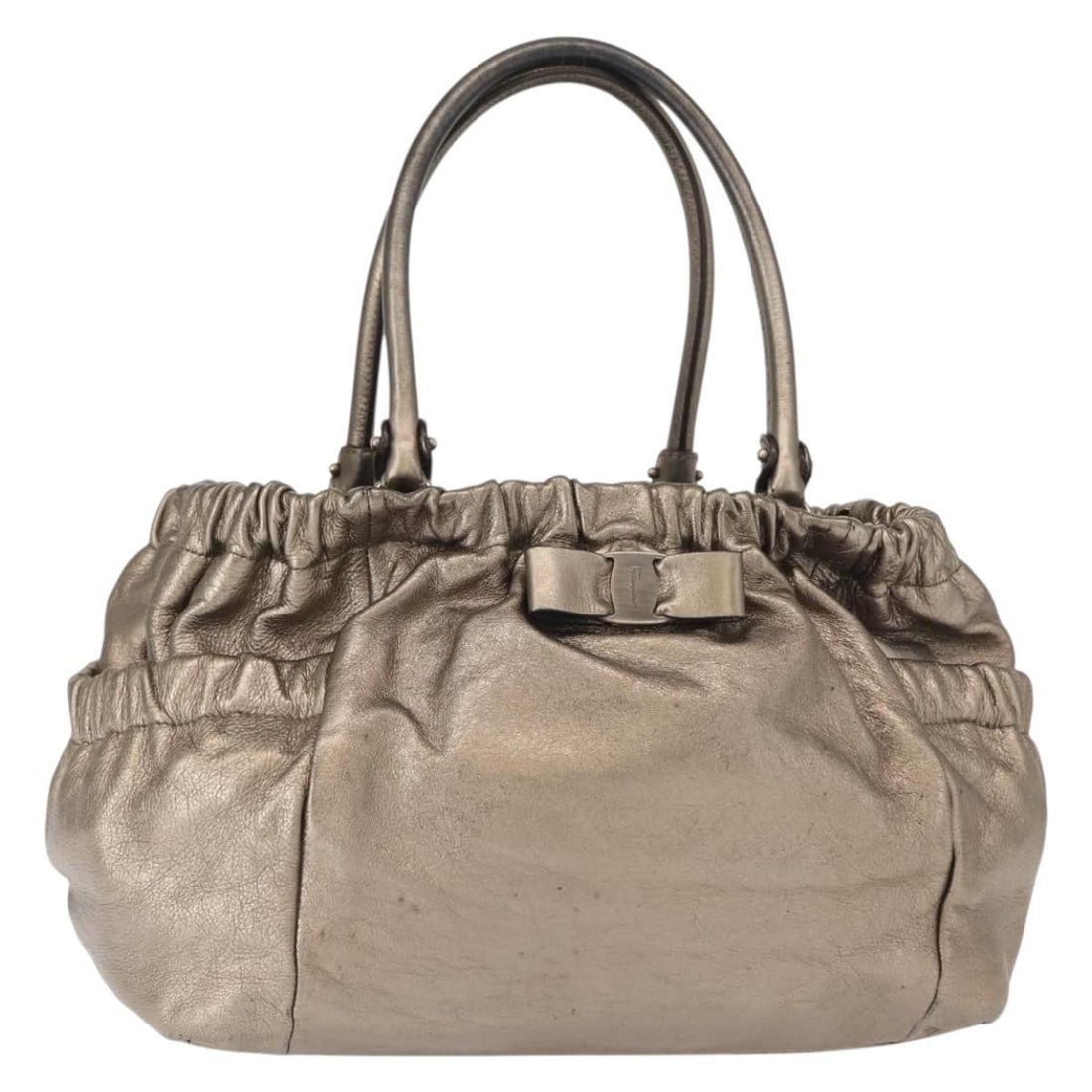 Ferragamo Vala Gold Leather Shoulder Bag Italy: Ferragamo Vala Gold Leather Shoulder Bag Italy This Salvatore Ferragamo Vala Shoulder Bag is crafted from gold-colored leather and designed for women. Made in Italy, it features a spacious interior an