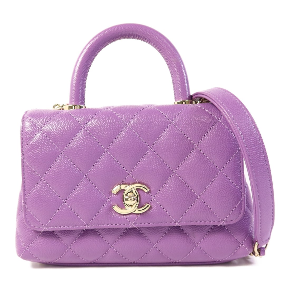 CHANEL Mini Coco Handle 2 Way Shoulder Bag Purple Calfskin GHW AS2215: CHANEL Mini Coco Handle 2 Way Shoulder Bag Purple Calfskin GHW AS2215 This CHANEL Mini Coco Handle 2 Way Shoulder Bag combines elegance and versatility with its stunning purple calfskin leather exteri