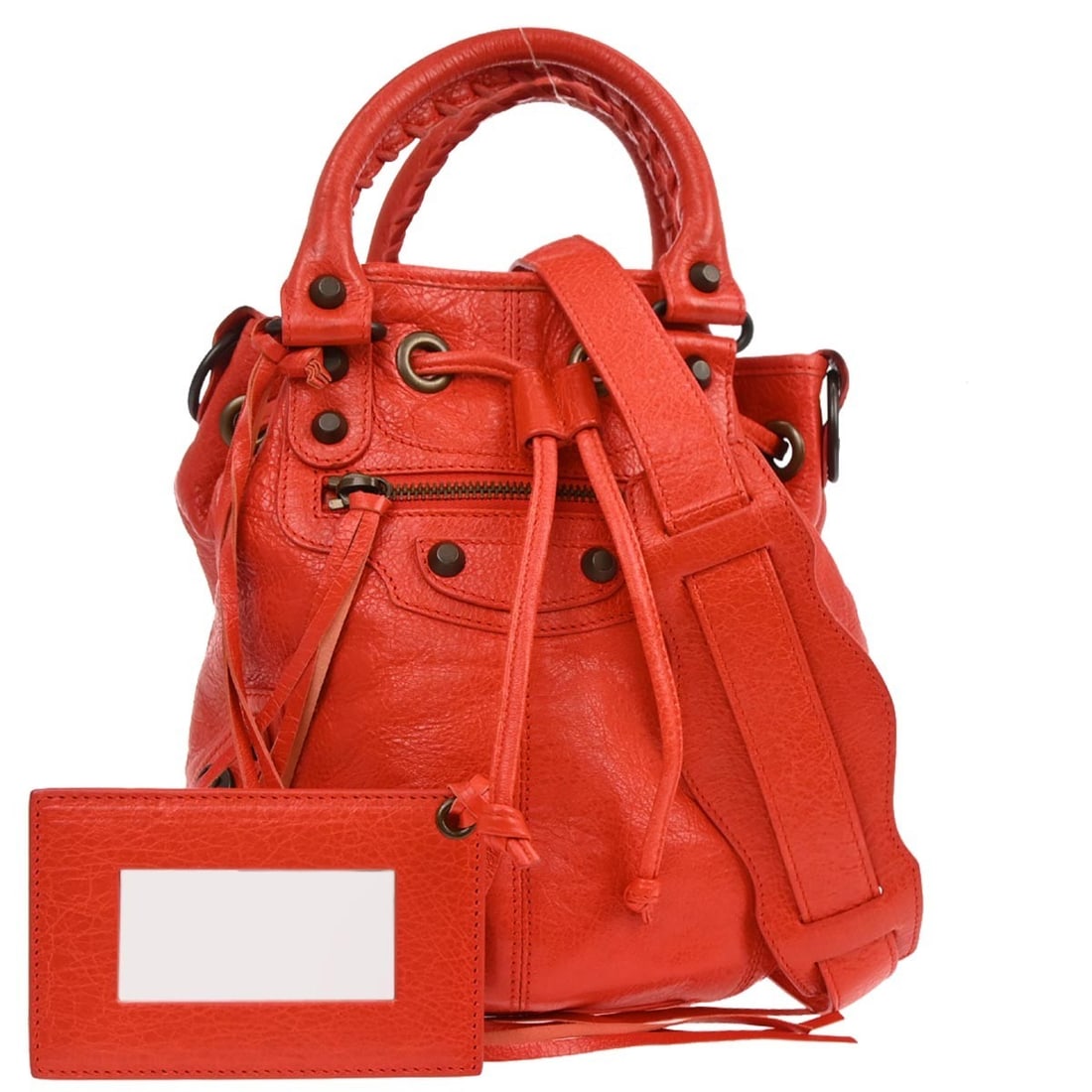 Balenciaga Mini Pompon Red Leather 2way Handbag with Top Handle: Balenciaga Mini Pompon Red Leather 2way Handbag with Top Handle This Balenciaga Classic Mini Pompon handbag features a vibrant red leather exterior and a compact silhouette. Designed for versatility,