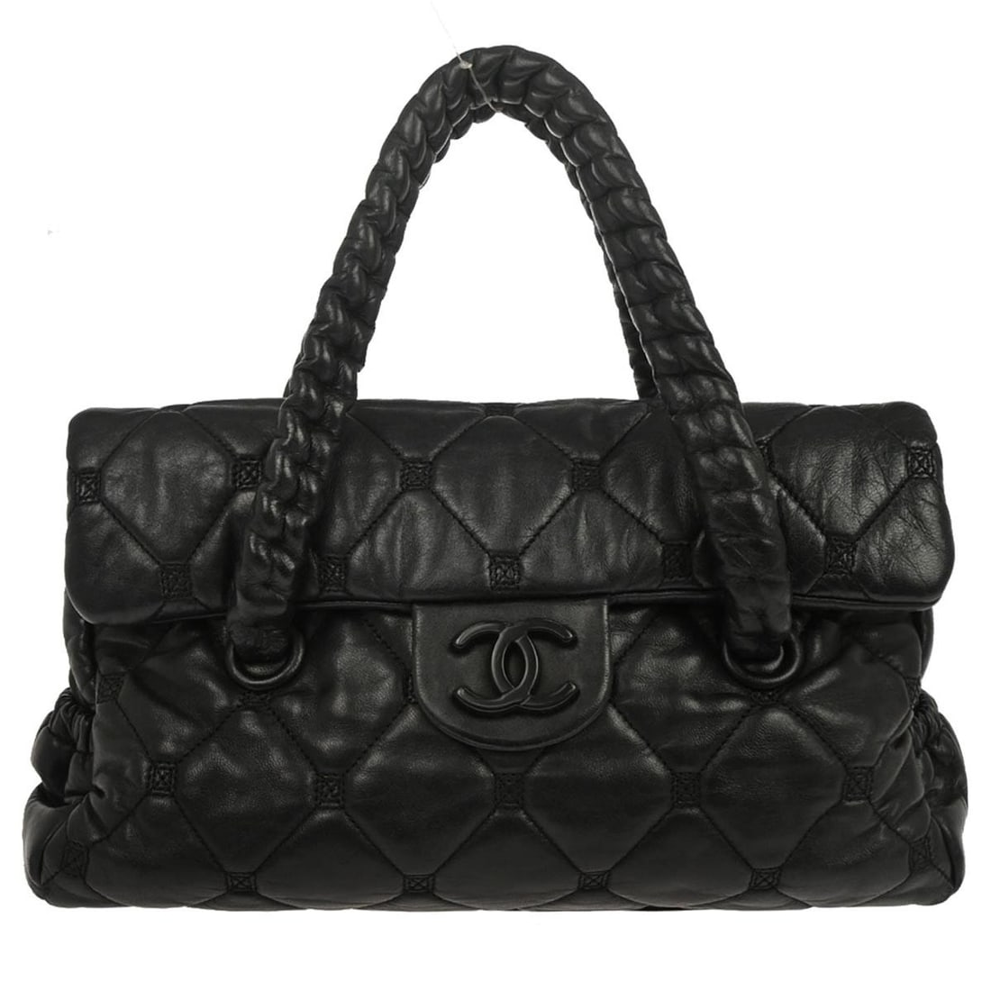 Small Black Leather Double Handle Chanel Handbag with Turnlock Closure: Small Black Leather Double Handle Chanel Handbag with Turnlock Closure This Chanel handbag is crafted from black lambskin leather and features a structured silhouette with double handles and a turnloc