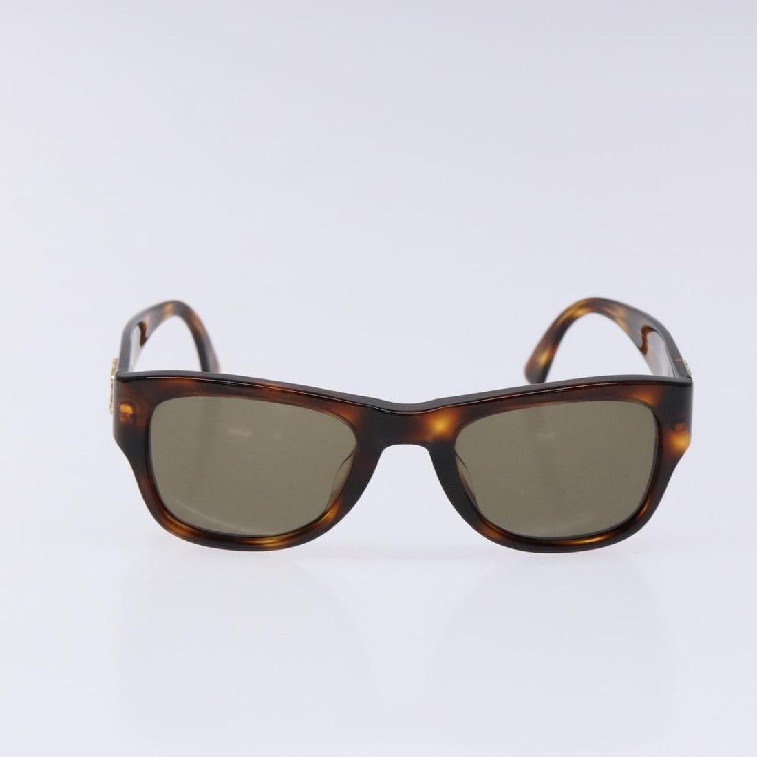Chanel Plastic Brown Sunglasses with CC Logo for Women: Chanel Plastic Brown Sunglasses with CC Logo for Women Chanel Logo CC sunglasses designed for women, featuring a brown plastic frame. These pre-owned sunglasses are in good condition with minor surfac