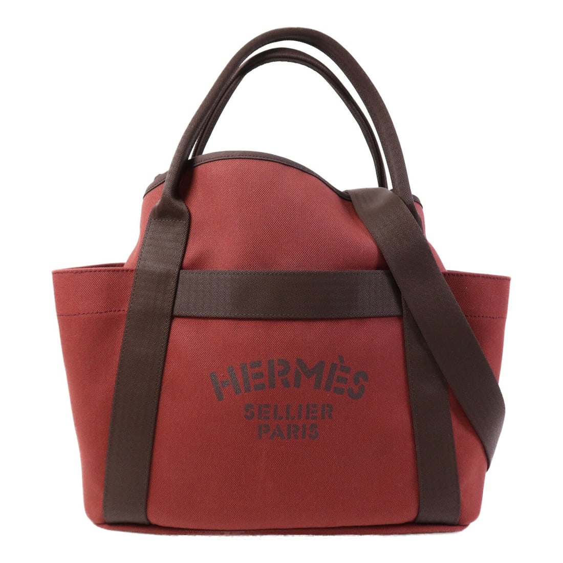 Hermes Rouge H Canvas Grooming Bag with Palladium Hardware Shoulder Strap: Hermes Rouge H Canvas Grooming Bag with Palladium Hardware Shoulder Strap This Hermes 2-way shoulder bag features a stylish canvas exterior in red, designed for versatile carrying options. Made in Fra