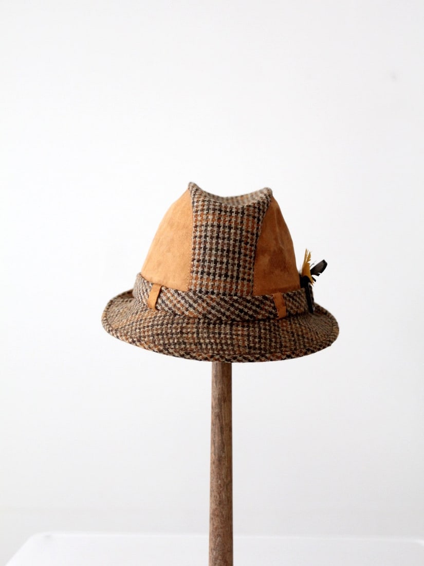 Rare 1950s Resistol Plaid Wool Fedora with Suede Paneling: Rare 1950s Resistol Plaid Wool Fedora with Suede Paneling This vintage Resistol fedora from the 1950s-1960s is a rare find, showcasing a distinctive plaid wool body complemented by elegant tan suede p