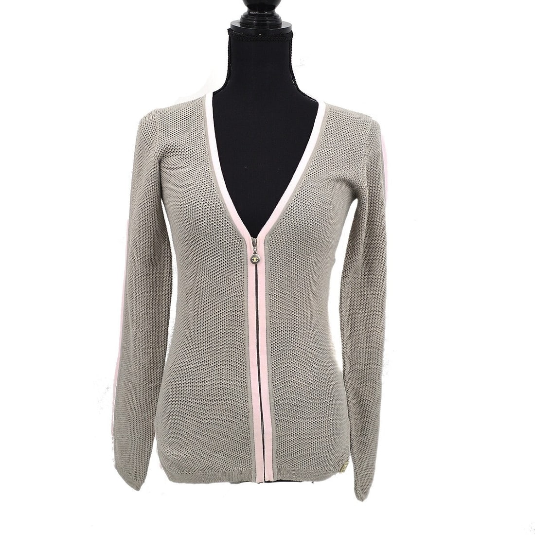 Chanel 03P Sport Line Long Sleeve Top Gray Pink Cotton: Chanel 03P Sport Line Long Sleeve Top Gray Pink Cotton Elevate your casual wardrobe with this elegant Chanel long sleeve top. Crafted from 100% cotton, it features a stylish gray pink color scheme and