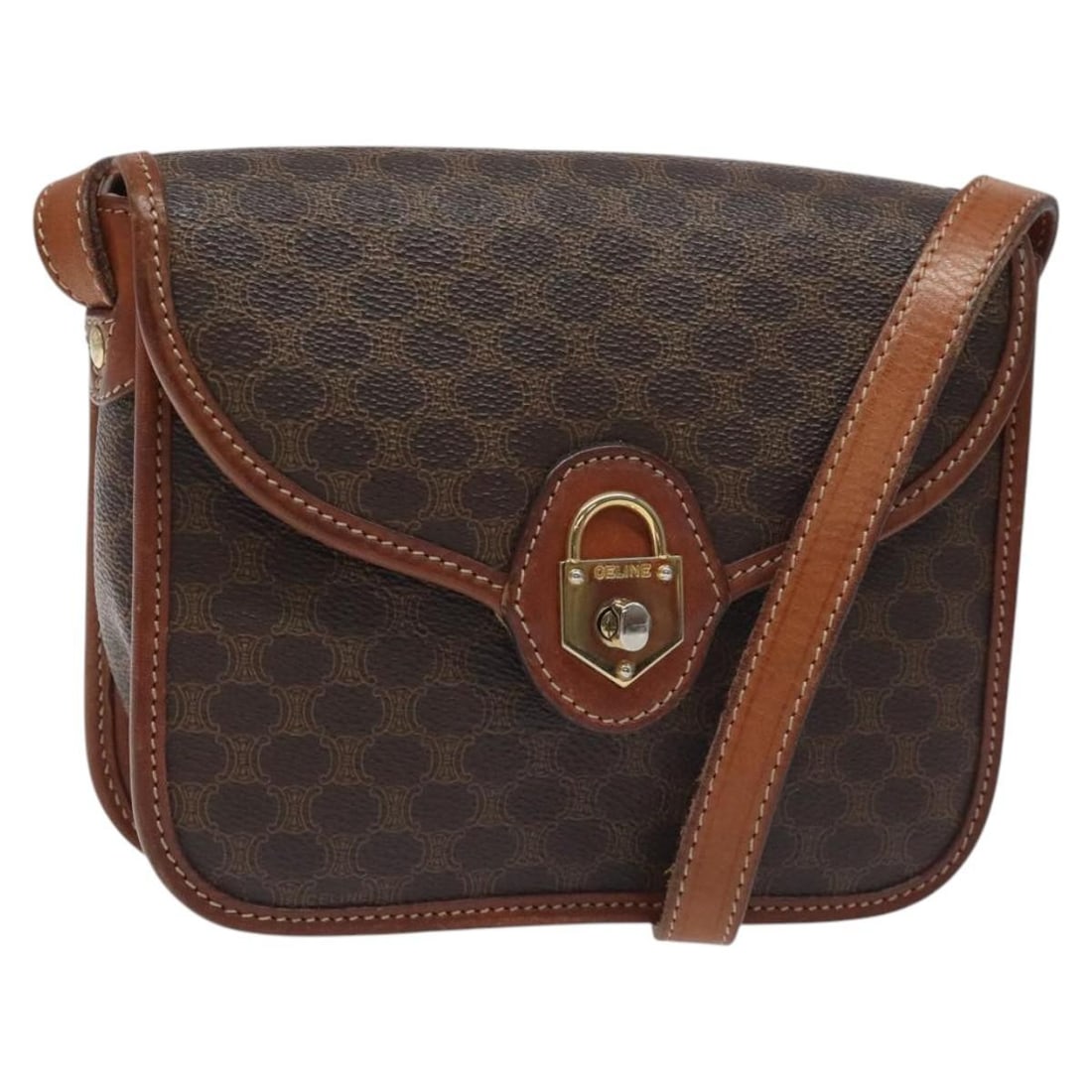 Celine Brown Macadam Canvas and Leather Vintage Shoulder Bag: Celine Brown Macadam Canvas and Leather Vintage Shoulder Bag This Celine Vintage Macadam Shoulder Bag features the iconic brown canvas design with leather accents. Designed for women, it offers a time