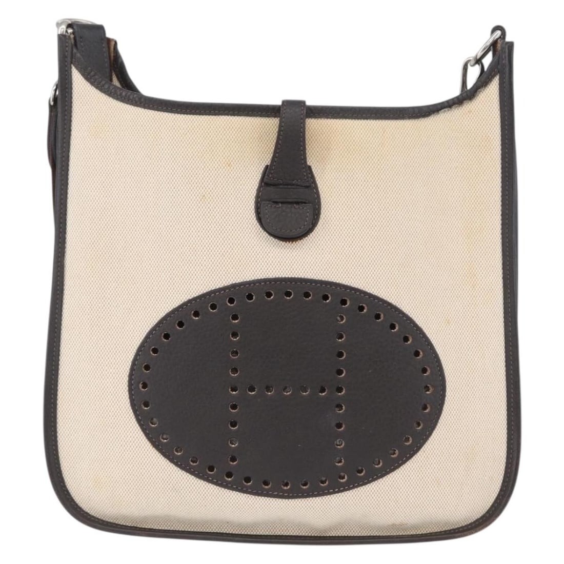 Evelyne Gen II Beige Leather and Toile Shoulder Bag by Hermes: Evelyne Gen II Beige Leather and Toile Shoulder Bag by Hermes The Hermes Evelyne Bag Gen II features a combination of toile and leather in a beige color. This shoulder bag is designed for women and is