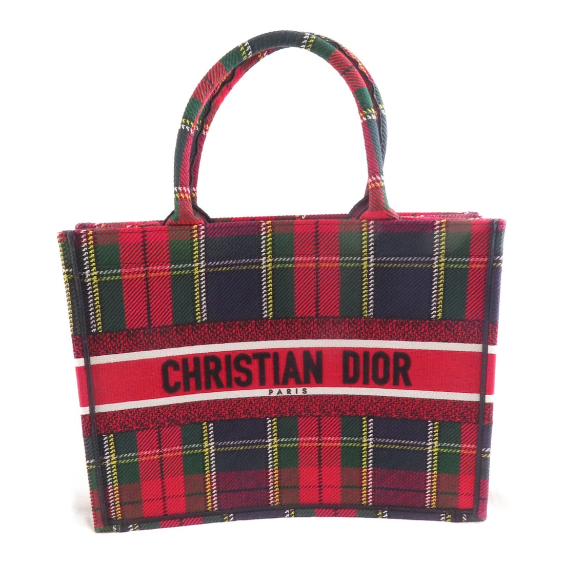 Dior Book Tote Canvas Bag in Red and Green Made in France: Dior Book Tote Canvas Bag in Red and Green Made in France This Christian Dior Book Tote Bag features a striking red and green canvas exterior. Crafted in France, the tote bag offers a spacious interio