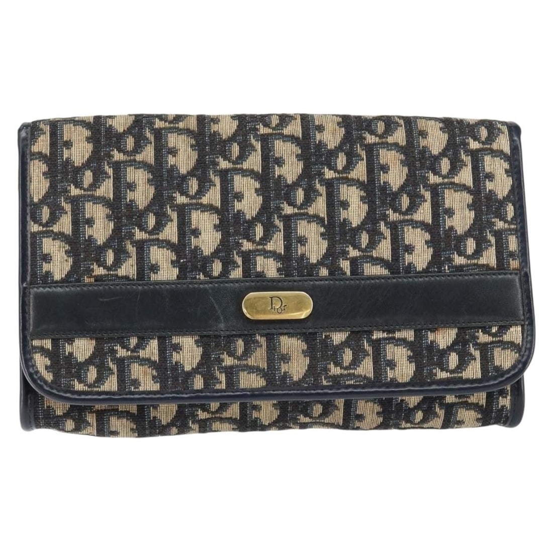 Navy Canvas Trotter Shoulder Bag by Christian Dior Vintage: Navy Canvas Trotter Shoulder Bag by Christian Dior Vintage This Christian Dior Vintage Trotter shoulder bag features navy canvas with leather accents and is designed for women. The bag is pre-owned an