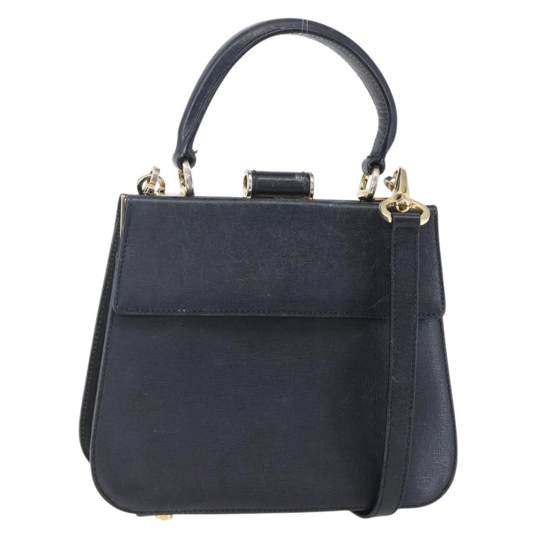 Black Leather Shoulder Purse by Salvatore Ferragamo Vintage Collection: Black Leather Shoulder Purse by Salvatore Ferragamo Vintage Collection This Salvatore Ferragamo vintage shoulder bag for women is crafted from black leather. The bag displays signs of use, including r