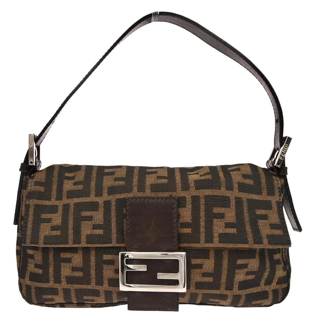 Fendi Zucca Canvas Baguette Shoulder Bag Brown with Silver Hardware: Fendi Zucca Canvas Baguette Shoulder Bag Brown with Silver Hardware This Fendi Brown Zucca Baguette handbag features the iconic logo canvas exterior with a medium size silhouette. It is designed with