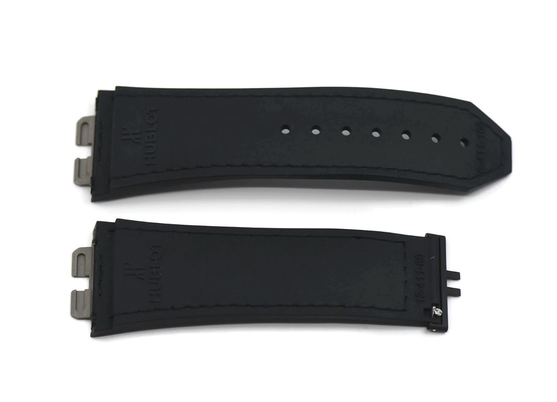 Hublot Authentic Black Rubber Wristwatch Band 27mm: Hublot Authentic Black Rubber Wristwatch Band 27mm This Hublot black rubber wristwatch band features a sleek design perfect for enhancing the style of your timepiece. Made from durable rubber, this st