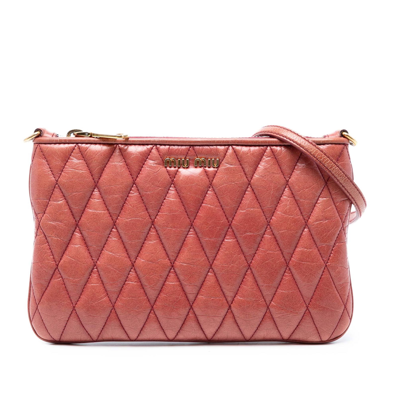 Miu Miu Matelasse Red Lambskin Crossbody Bag with Adjustable Strap: Miu Miu Matelasse Red Lambskin Crossbody Bag with Adjustable Strap Introducing the Miu Miu Matelasse Lambskin Crossbody, a stylish accessory crafted from luxurious quilted lambskin leather. This bag f