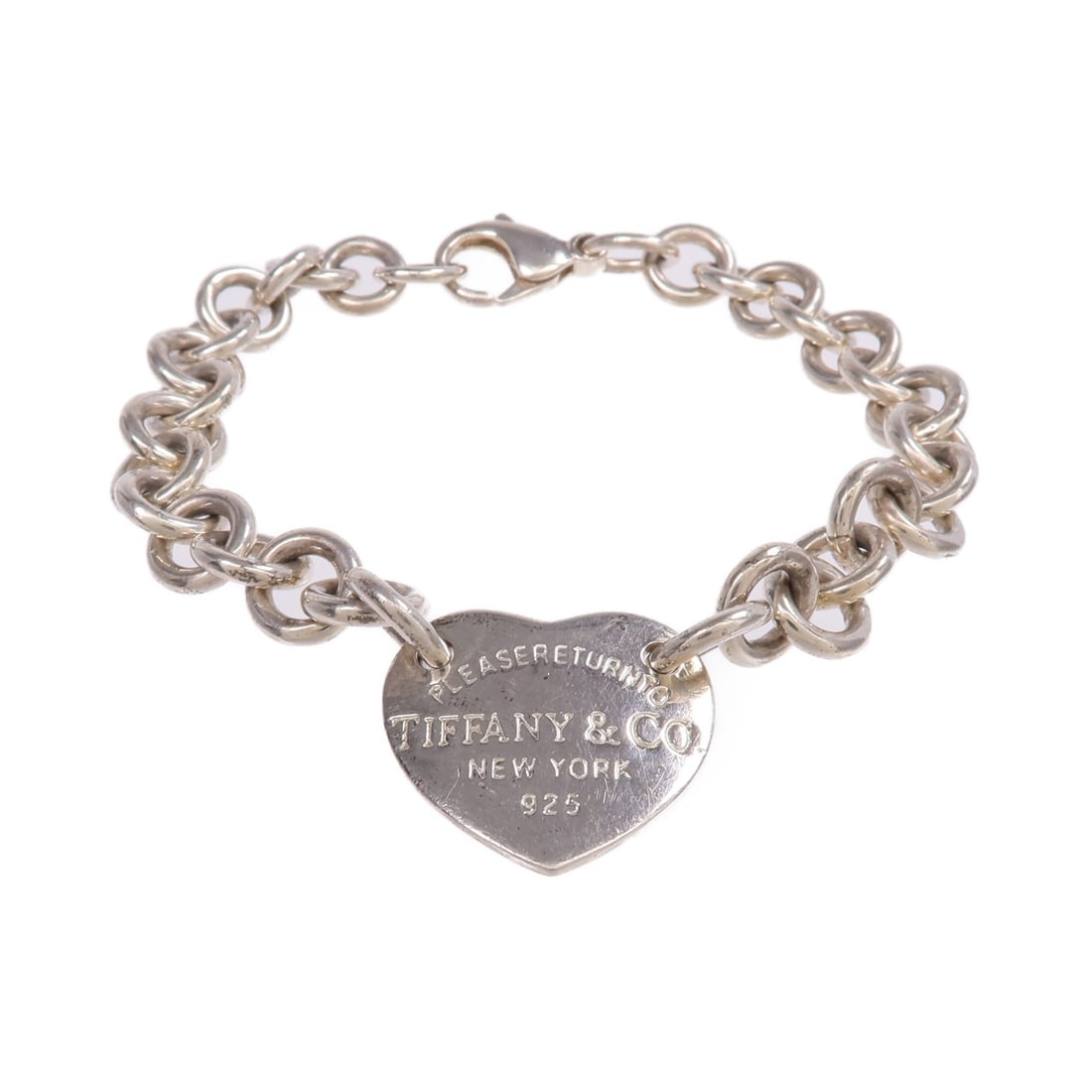 925 Silver Heart Tag Bracelet by Tiffany & Co: 925 Silver Heart Tag Bracelet by Tiffany & Co This Tiffany & Co. Return To Heart Tag bracelet is crafted from 925 sterling silver and features a signature heart tag design. Made in the United States,