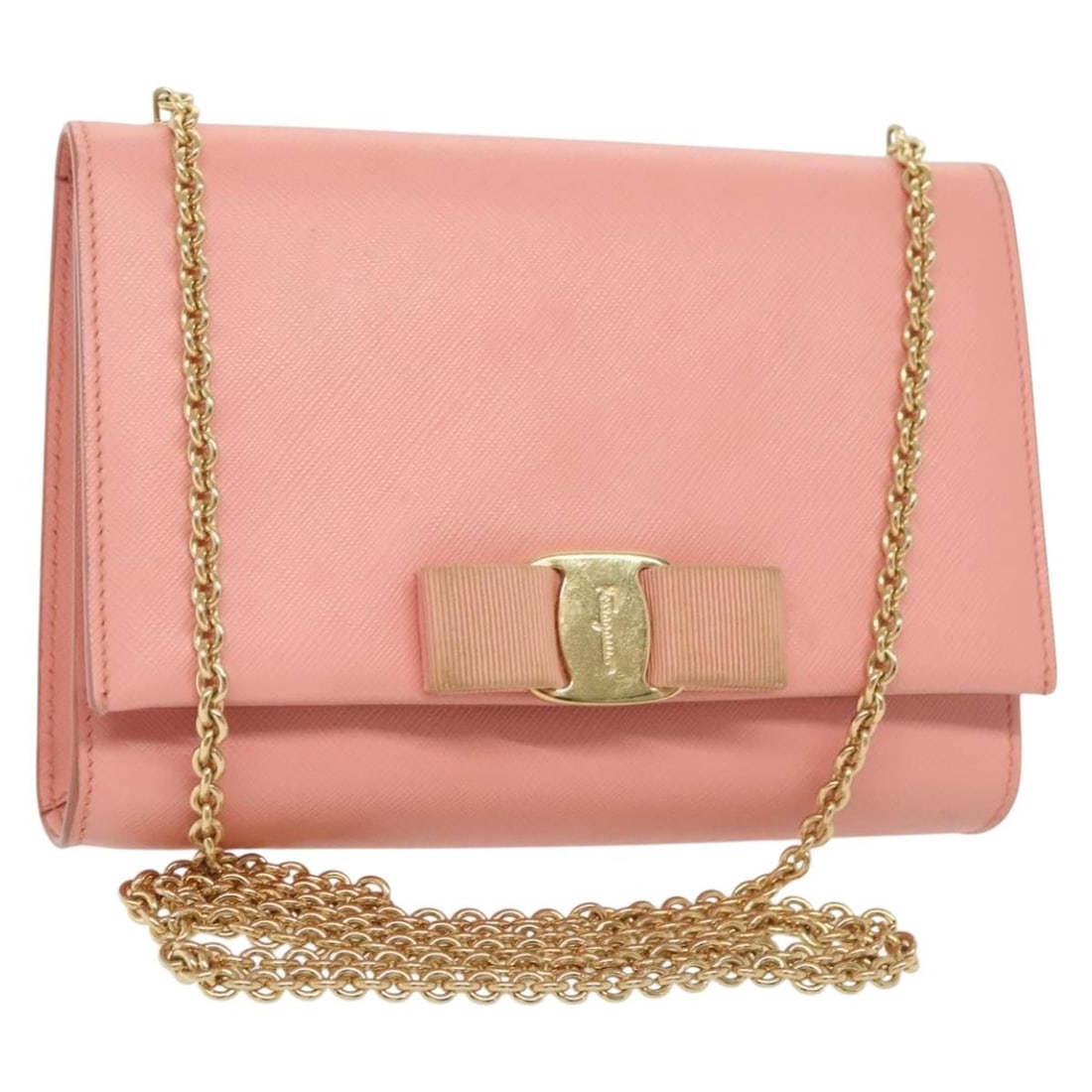 Ginny Crossbody Bag in Pink Leather by Salvatore Ferragamo: Ginny Crossbody Bag in Pink Leather by Salvatore Ferragamo This Salvatore Ferragamo Ginny Crossbody Bag is crafted from pink leather and designed for women. It features a compact silhouette with a cro