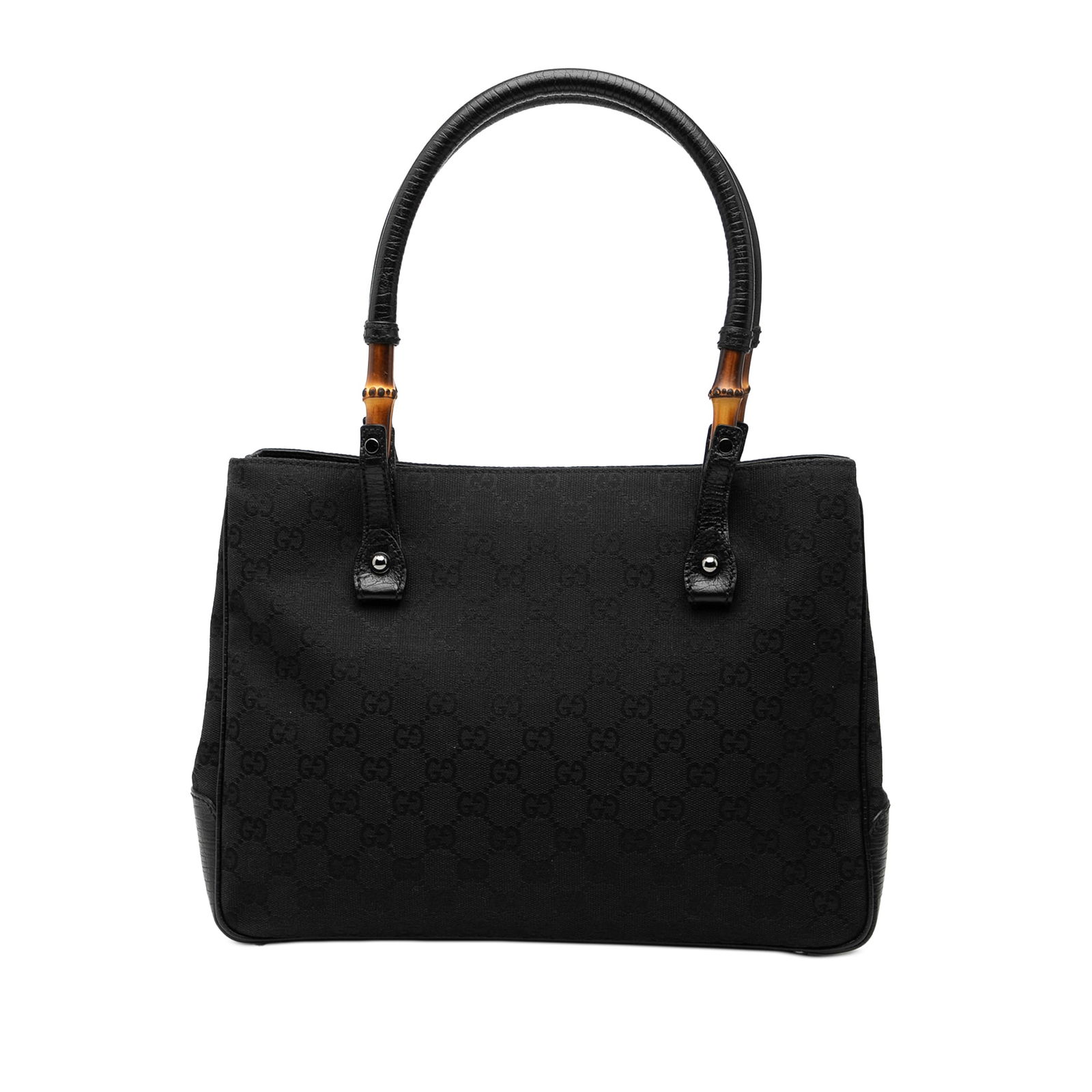GG Canvas Bamboo Handle Tote Bag by Gucci Black Fabric and Leather Trim: GG Canvas Bamboo Handle Tote Bag by Gucci Black Fabric and Leather Trim This Gucci GG Canvas Bamboo Tote features a canvas body with leather trim, rolled leather handles accented with bamboo details,