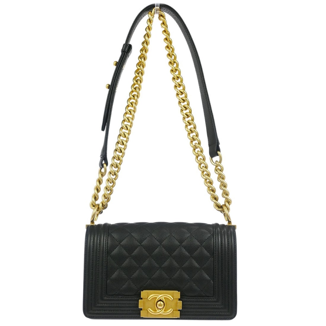 Black Quilted Leather Chanel Boy Flap Bag 20cm: Black Quilted Leather Chanel Boy Flap Bag 20cm This Chanel Boy Flap Bag is crafted from quilted caviar leather in black, designed for women. It features a sleek flap closure and is noted for being in