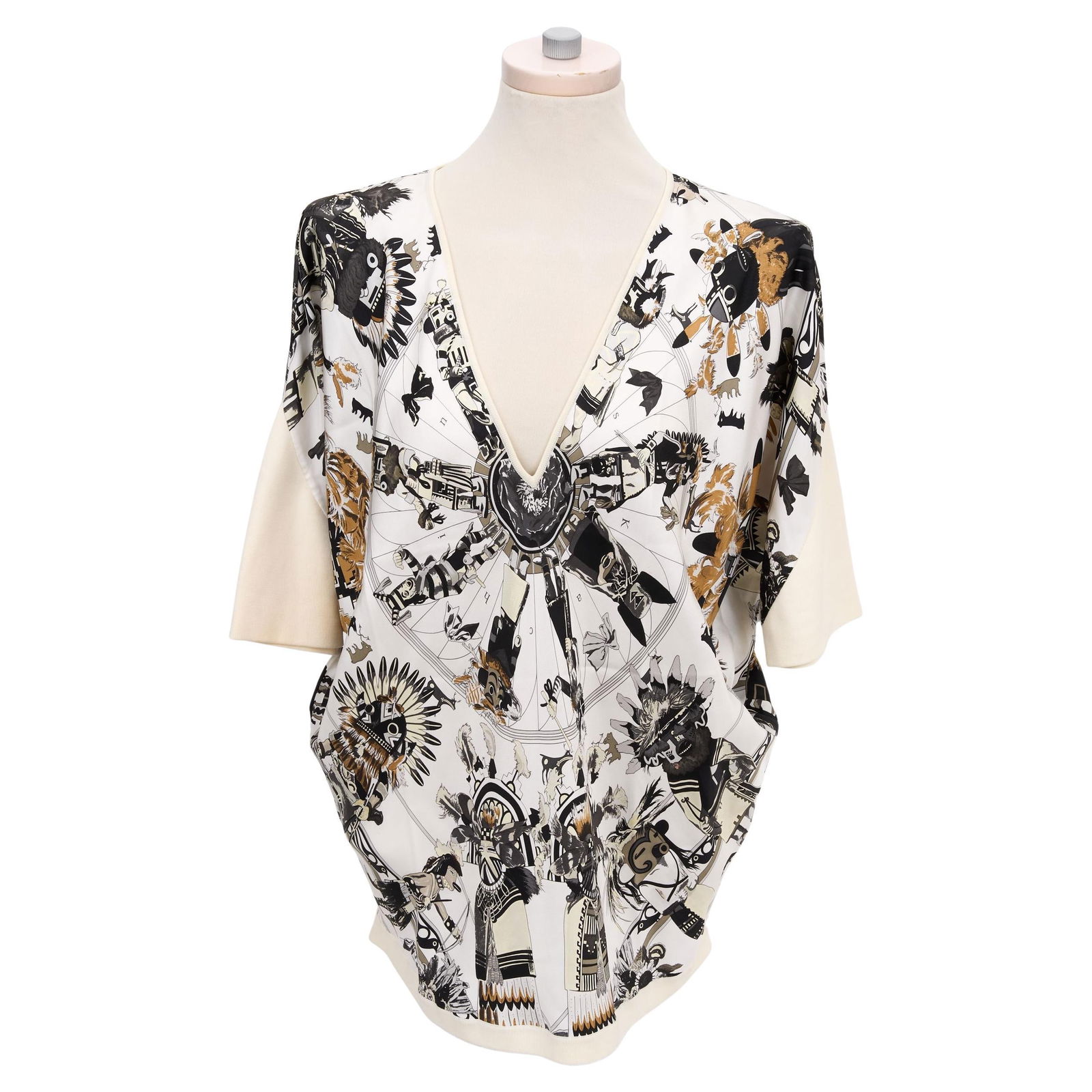 Hermes Kachinas Silk Shirt by Kermit Oliver White Design: Hermes Kachinas Silk Shirt by Kermit Oliver White Design This exquisite Hermes shirt showcases the iconic Kachinas design by Kermit Oliver, featuring a striking white background adorned with intricate