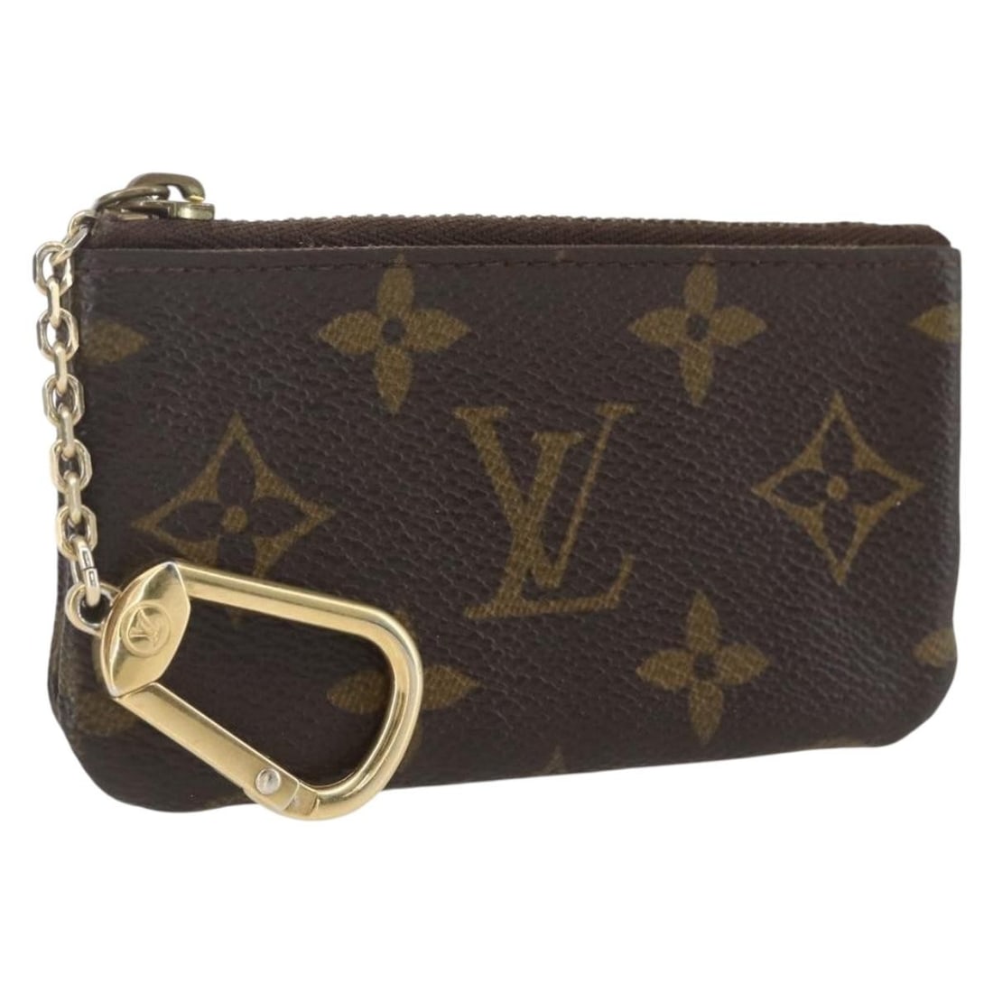 Monogram Canvas Coin Purse Louis Vuitton Pochette Cles M60033: Monogram Canvas Coin Purse Louis Vuitton Pochette Cles M60033 This Louis Vuitton Monogram Pochette Cles Coin Purse features the iconic monogram canvas exterior. Made in Spain, this compact coin purse