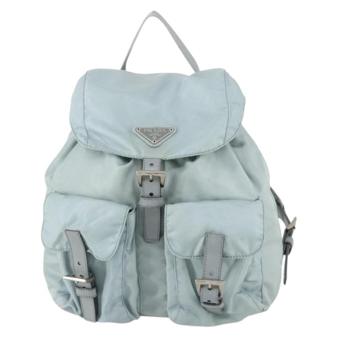 Blue Nylon Prada Vela Backpack with Dual Front Pockets and Saffiano Trim: Blue Nylon Prada Vela Backpack with Dual Front Pockets and Saffiano Trim This Prada Vela backpack for women features a nylon body with Saffiano leather details. It includes double front pockets for co