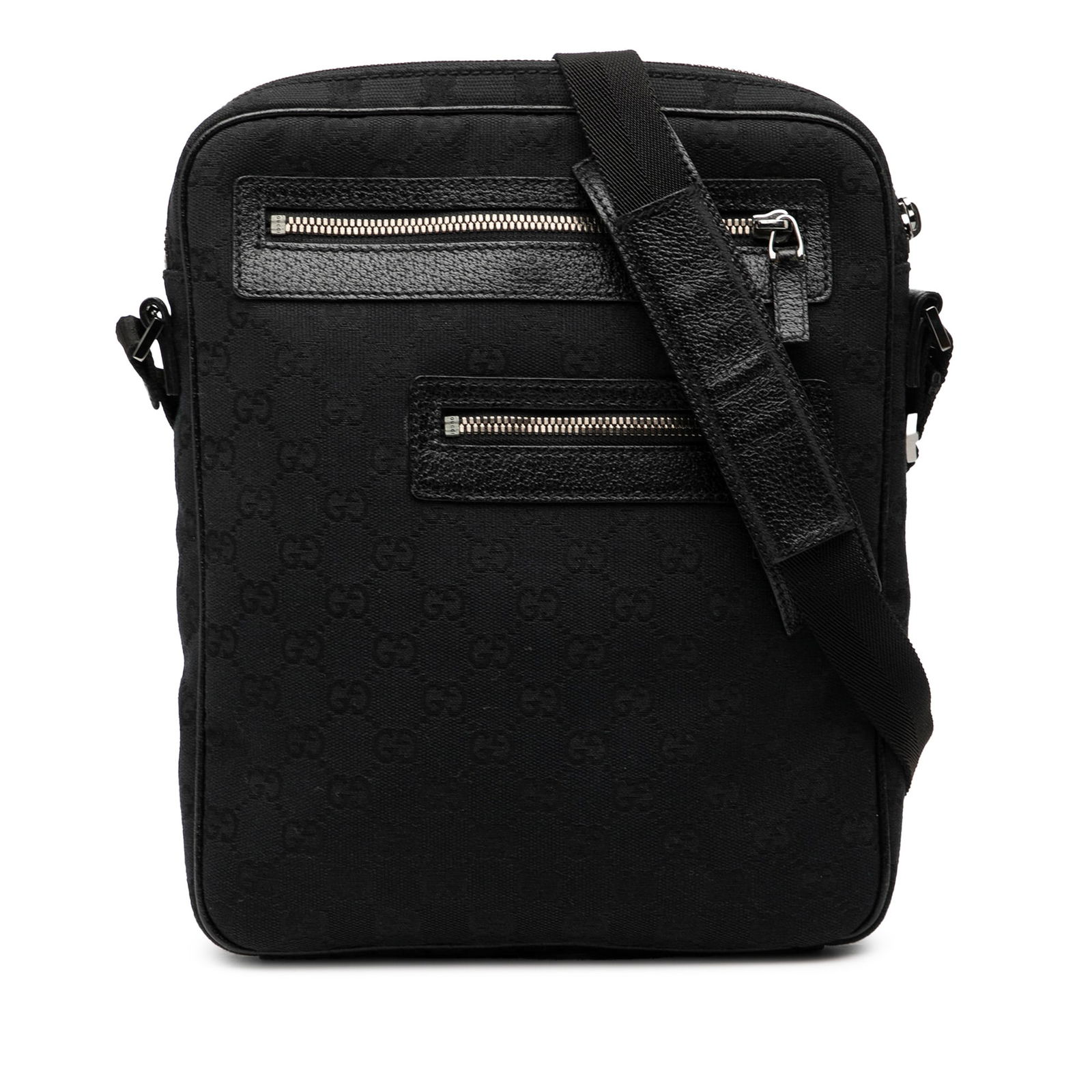 GG Canvas Shoulder Bag with Leather Trim by Gucci: GG Canvas Shoulder Bag with Leather Trim by Gucci This Gucci GG Canvas Crossbody bag features a black canvas body with leather trim, two front exterior zip pockets, a flat strap, a top zip closure, an