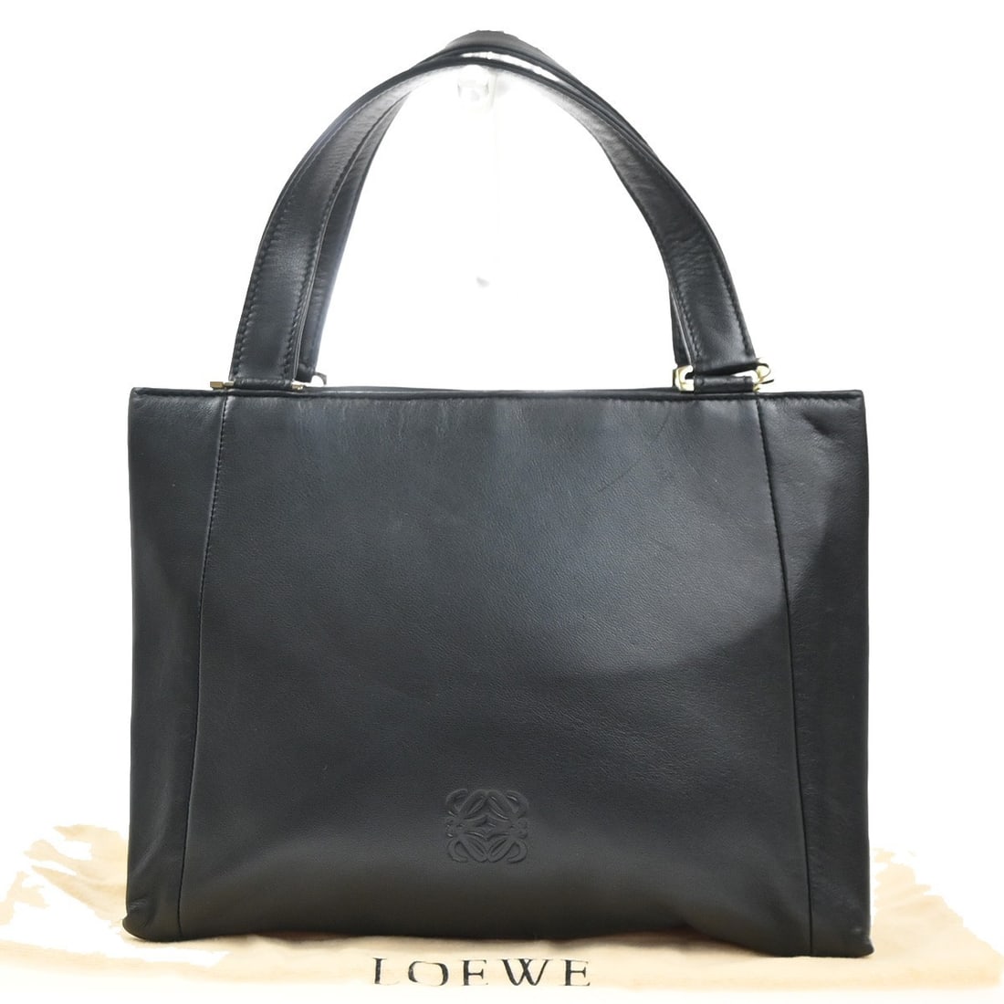 Black Anagram Tote Bag by Loewe in Leather for Women: Black Anagram Tote Bag by Loewe in Leather for Women This Loewe Anagram Tote is crafted from black leather and designed for women. The bag features the signature Anagram motif and offers a spacious in