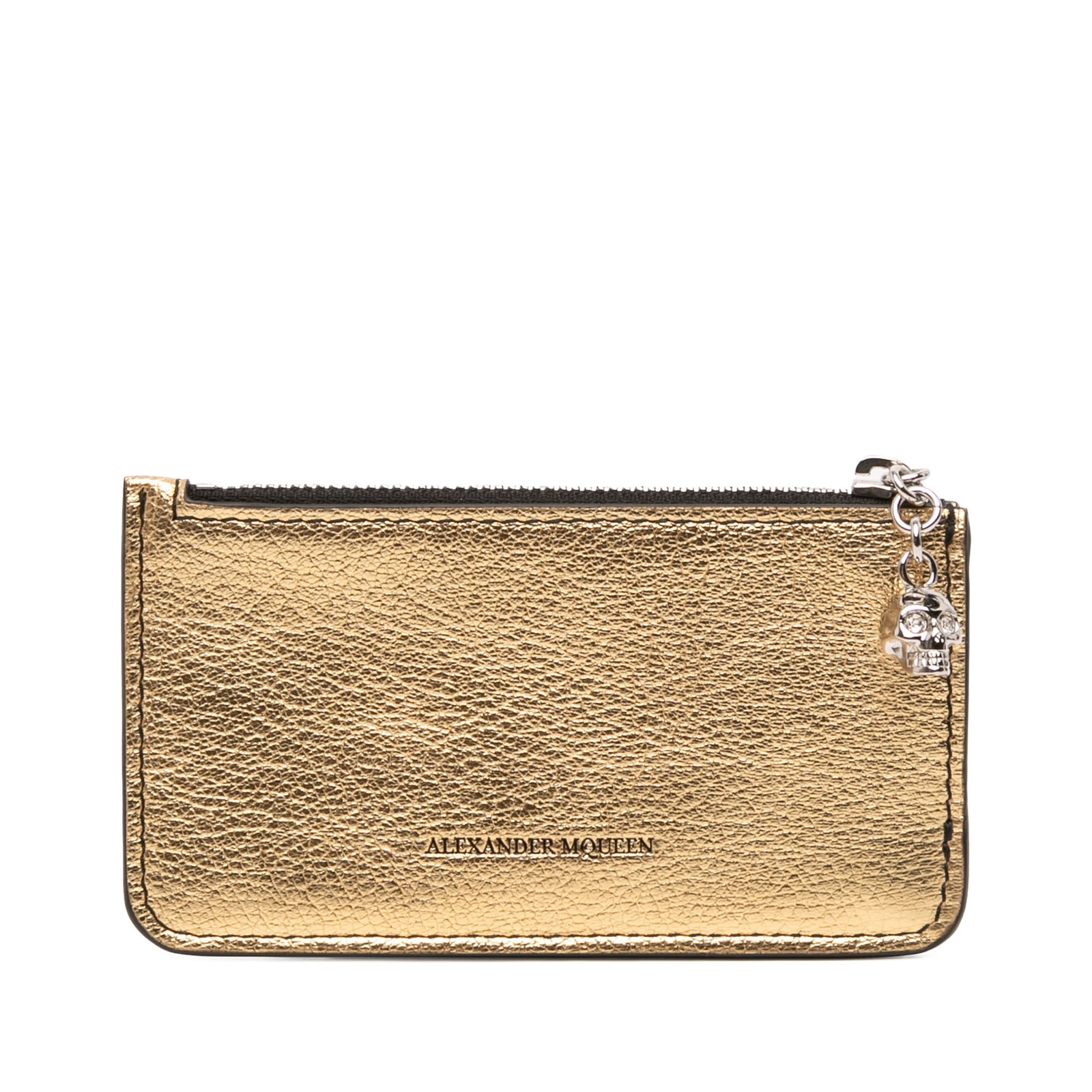 Metallic Leather Card Holder with Skull Zip by Alexander McQueen: Metallic Leather Card Holder with Skull Zip by Alexander McQueen This card holder features a metallic leather body in gold, a top zip closure adorned with a skull charm, and exterior card slots. Made