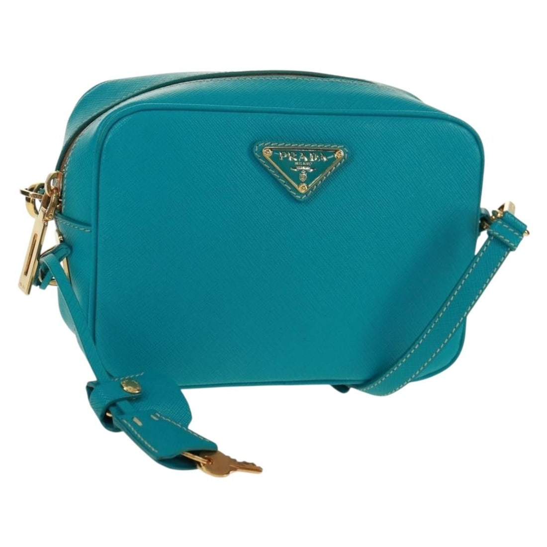 Prada Saffiano Leather Turquoise Blue Shoulder Bag with Gold Tone Accents: Prada Saffiano Leather Turquoise Blue Shoulder Bag with Gold Tone Accents This is a Prada shoulder bag crafted from turquoise blue Saffiano leather with gold-tone accents. Made in Italy, the bag featu