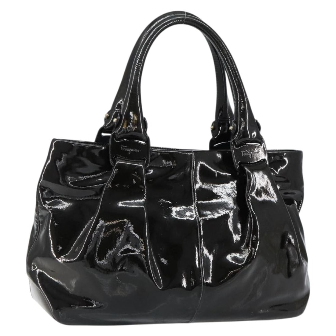 Salvatore Ferragamo Black Patent Leather Vintage Tote Bag 40x21x10cm: Salvatore Ferragamo Black Patent Leather Vintage Tote Bag 40x21x10cm This vintage Salvatore Ferragamo tote bag for women is crafted from black patent leather with metal fittings. It offers a spacious