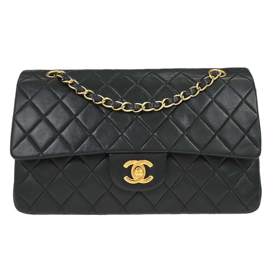 Medium Classic Double Flap Black Lambskin Shoulder Bag by Chanel: Medium Classic Double Flap Black Lambskin Shoulder Bag by Chanel This Chanel Classic Double Flap shoulder bag is crafted from black lambskin leather and features a medium size with a turn lock closure