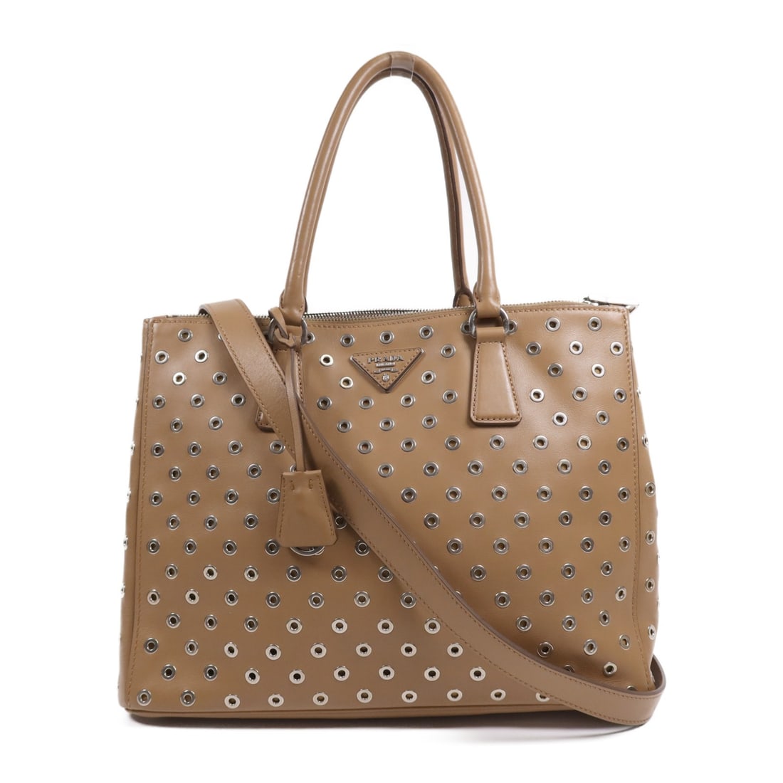 Prada Brown Calfskin Leather 2 Way Shoulder Bag Made in Italy: Prada Brown Calfskin Leather 2 Way Shoulder Bag Made in Italy This PRADA 2 Way Shoulder Bag showcases luxurious craftsmanship with its exquisite calfskin leather exterior in a rich brown color. Design