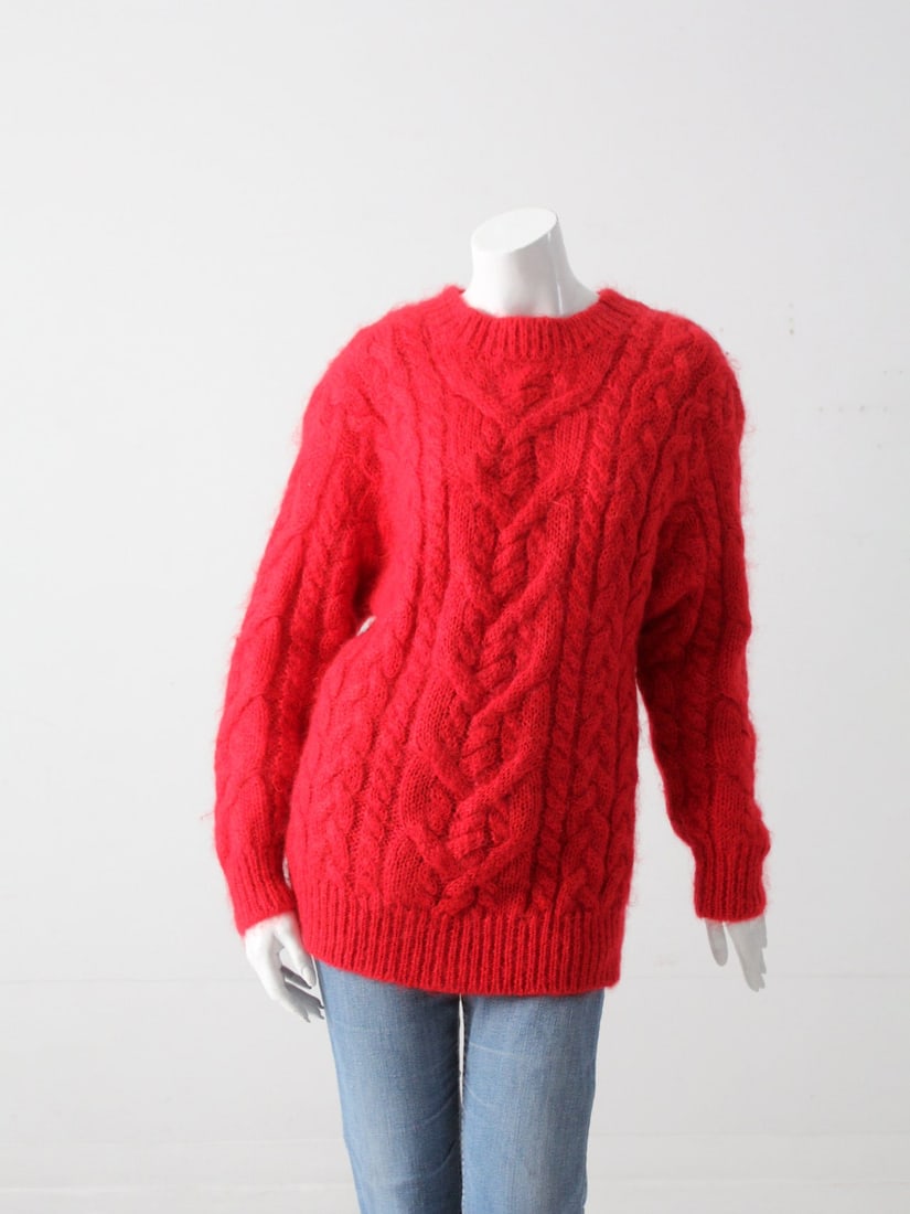 Red Mohair Cable Knit Vintage Pullover Sweater Size Medium: Red Mohair Cable Knit Vintage Pullover Sweater Size Medium This vintage mohair cable knit sweater features a textured design with a ribbed crew neck and a long, pullover fit. Made from soft mohair, it