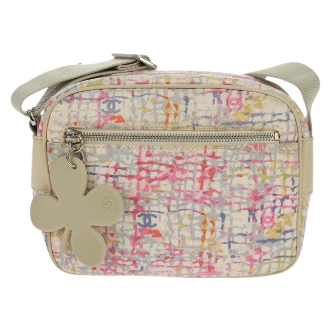 Printed Multicolor Canvas Chanel Clover Camera Shoulder Bag Vintage: Printed Multicolor Canvas Chanel Clover Camera Shoulder Bag Vintage This Chanel Vintage Clover Camera Bag features a printed multicolor canvas design. Crafted in Italy, it is designed for women and of