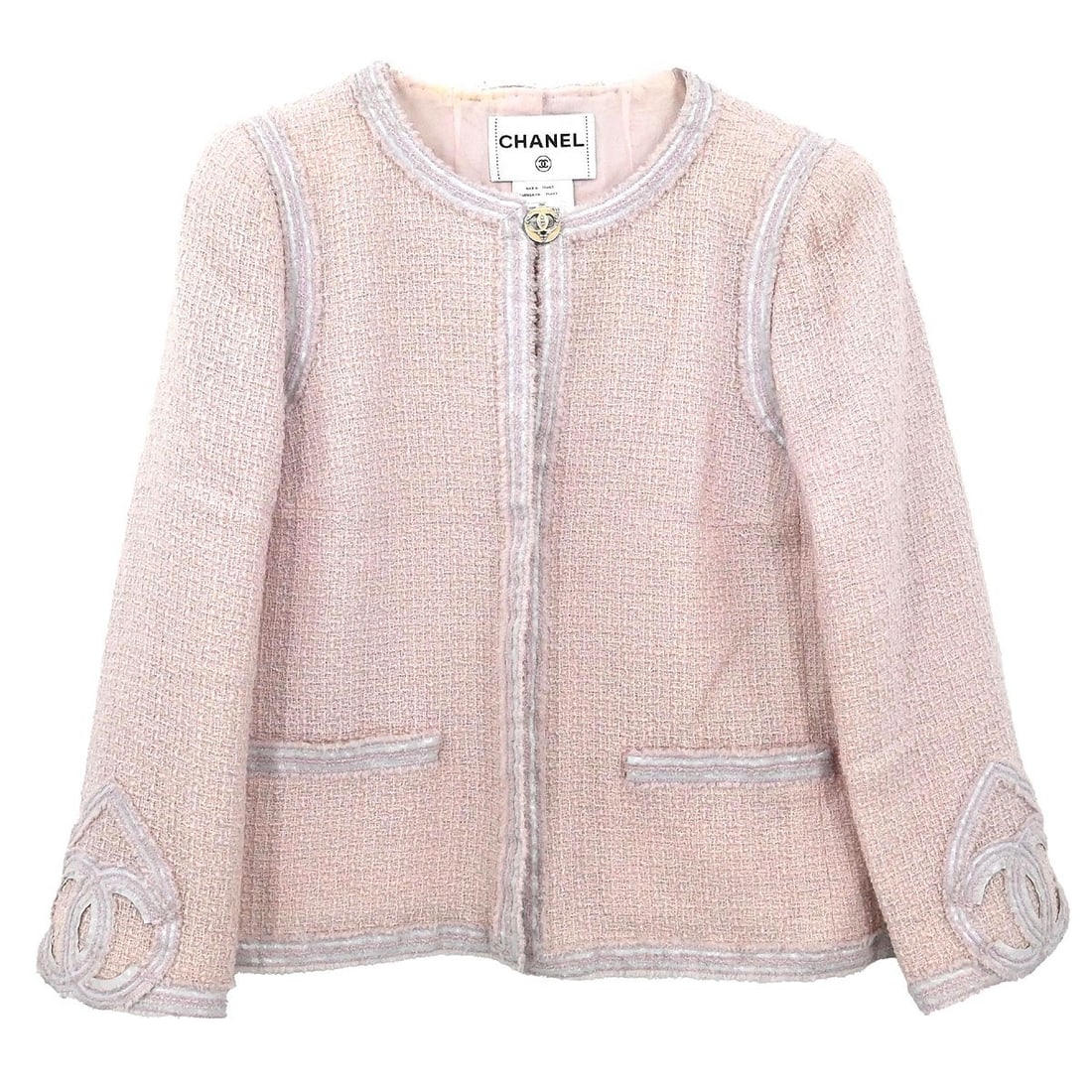 Light Pink Chanel Wool Blend Mid-Length Jacket Size 42: Light Pink Chanel Wool Blend Mid-Length Jacket Size 42 This light pink Chanel collarless single breasted jacket offers a classic and sophisticated look. Crafted from a blend of 99% wool and 1% nylon f