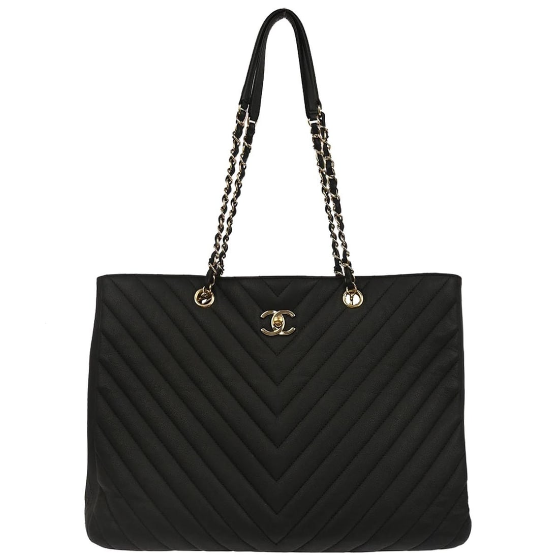 Large Chanel Chevron Tote Bag in Black Calfskin Leather with Chain Handles: Large Chanel Chevron Tote Bag in Black Calfskin Leather with Chain Handles This Chanel shopping tote features a stylish chevron design crafted from black calfskin leather. Designed with double handles