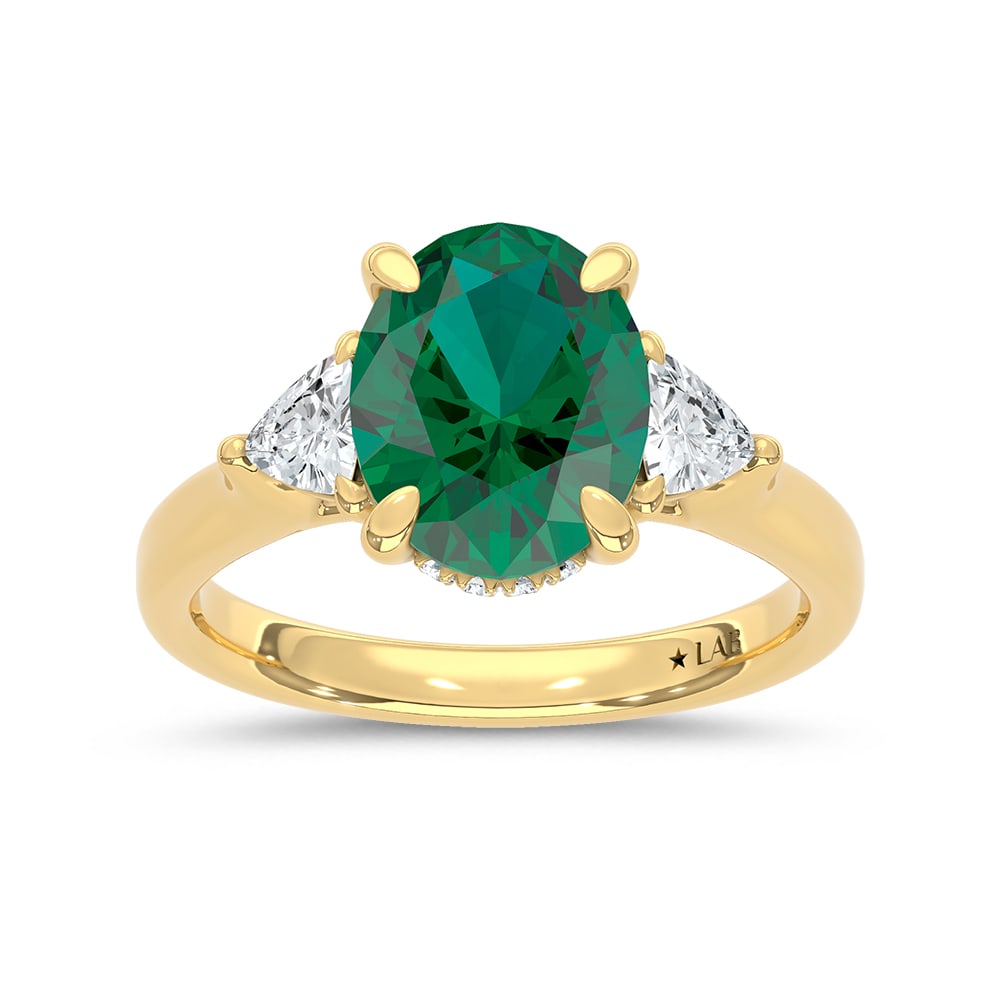 14K Yellow Gold Lab Grown Diamond 3 1/3 Ct.Tw. Oval Shape Recrystalized Emerald Engagement Ring: 14K Yellow Gold Lab Grown Diamond 3 1/3 Ct.Tw. Oval Shape Recrystalized Emerald Engagement Ring (Center 2 3/4 ct) Celebrate refined elegance with this 14K yellow gold engagement ring. Its centerpiece