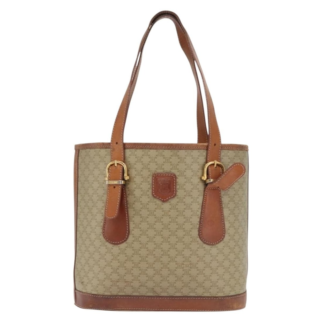 Vintage Macadam Canvas and Leather Tote Bag by Celine: Vintage Macadam Canvas and Leather Tote Bag by Celine This vintage Celine Macadam tote bag is crafted from beige canvas with leather accents, designed for female use. It features a spacious interior w