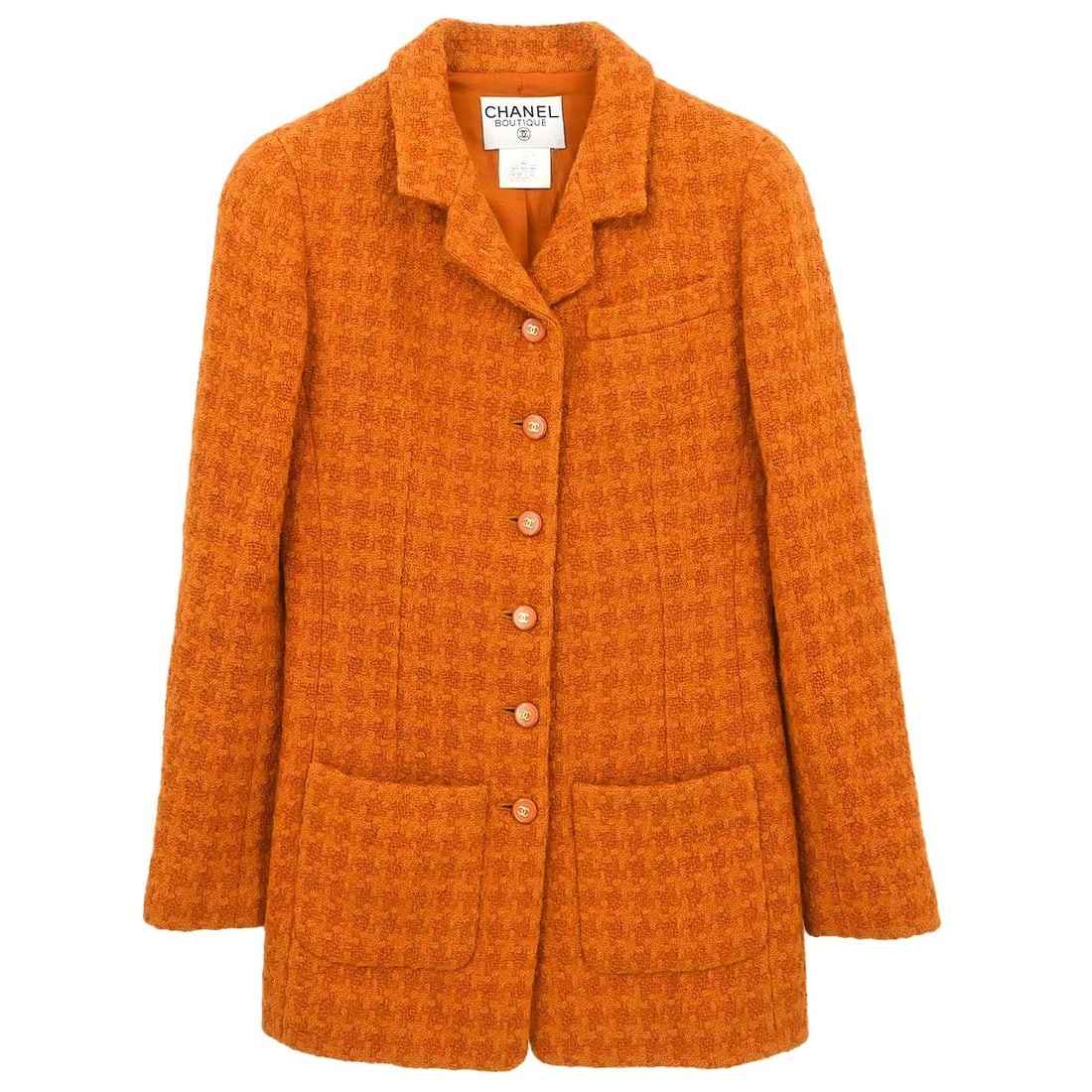 Long Orange Wool Jacket by Chanel Size 40 Vintage 95A: Long Orange Wool Jacket by Chanel Size 40 Vintage 95A This Chanel single-breasted jacket features a long silhouette crafted from a blend of 99% wool and 1% nylon, offering warmth and comfort for winte