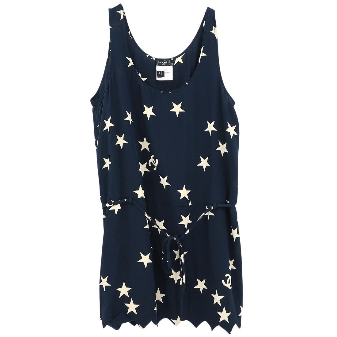 Navy Silk Sleeveless Tank Top by Chanel Size 40 08P Collection: Navy Silk Sleeveless Tank Top by Chanel Size 40 08P Collection This sleeveless Chanel top in navy is crafted from 100% silk and offers a regular fit. Designed in a basic tank style, it is a vintage pi