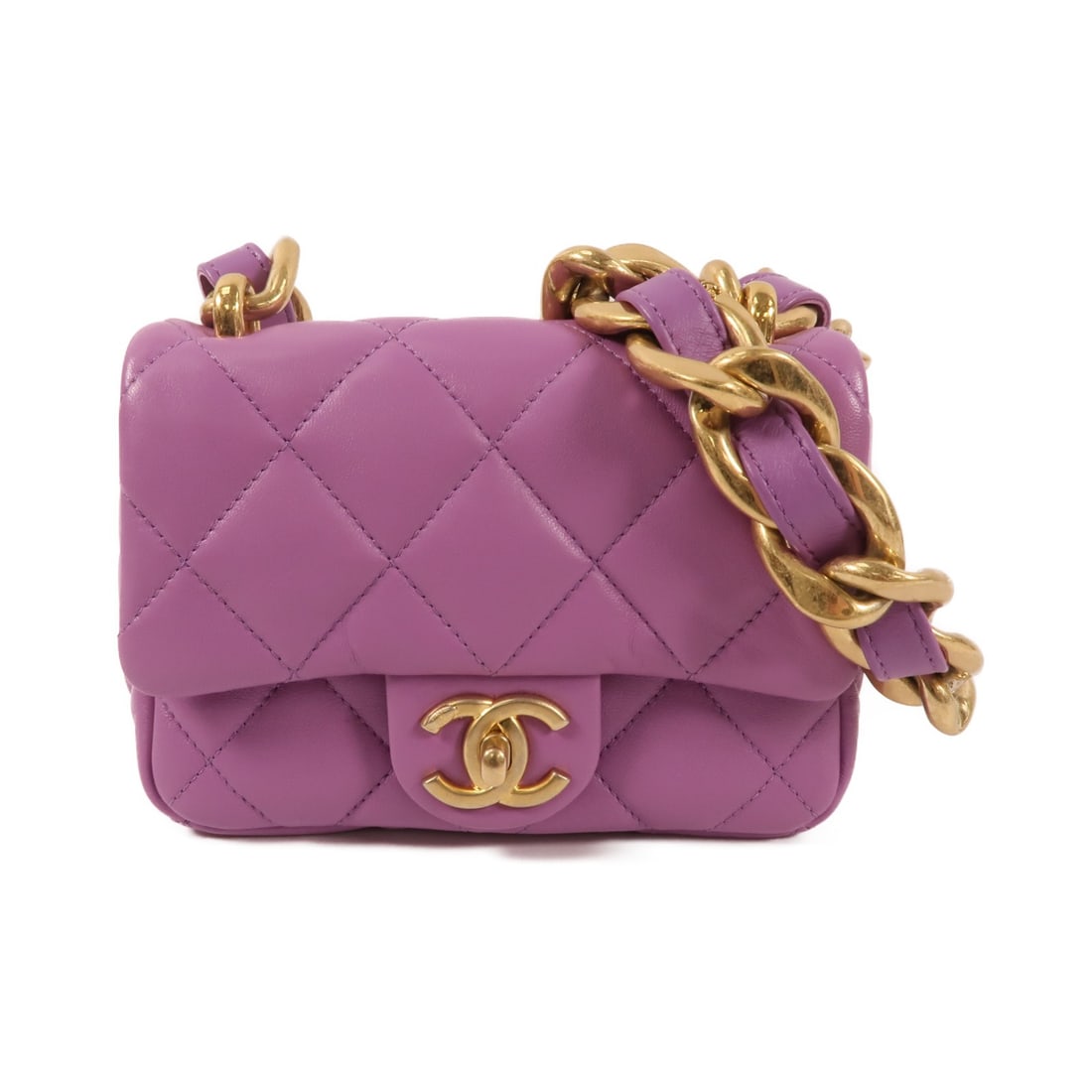Chanel Mini Flap Purple Lambskin Shoulder Bag with CC Logo and Gold Hardware: Chanel Mini Flap Purple Lambskin Shoulder Bag with CC Logo and Gold Hardware This CHANEL Mini Flap Bag is crafted from luxurious lambskin leather in a sophisticated purple hue. Featuring the iconic CC
